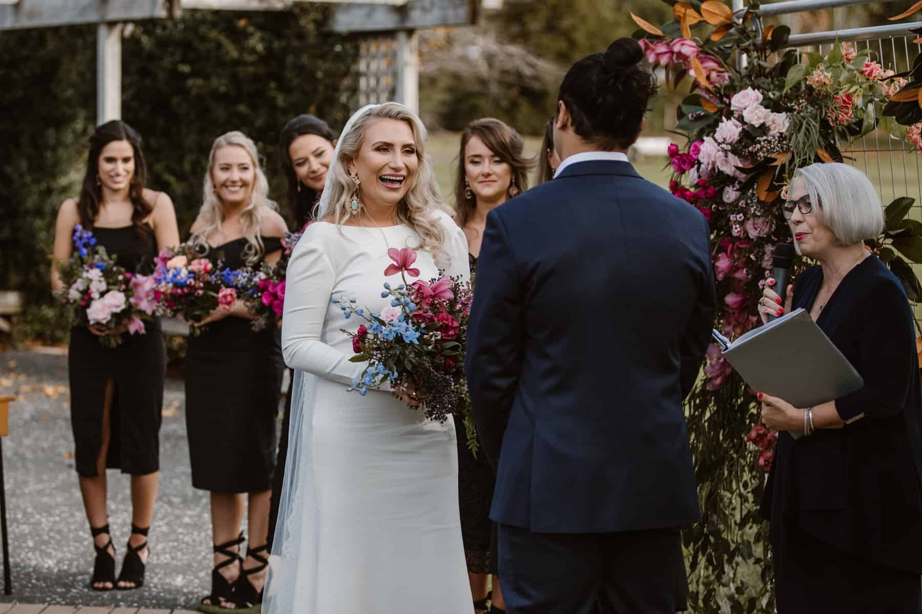 bride in minimal long-sleeve wedding dress