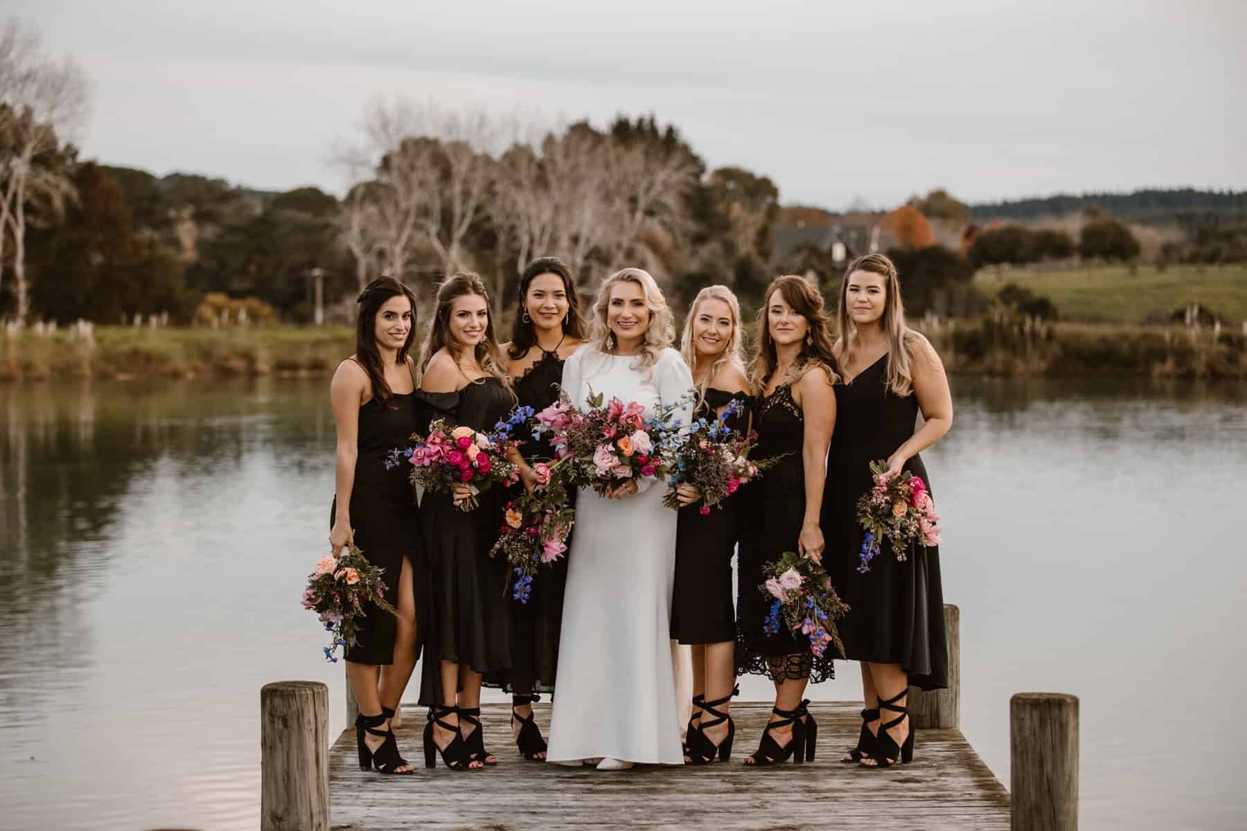 bridesmaids in mixed black dresses