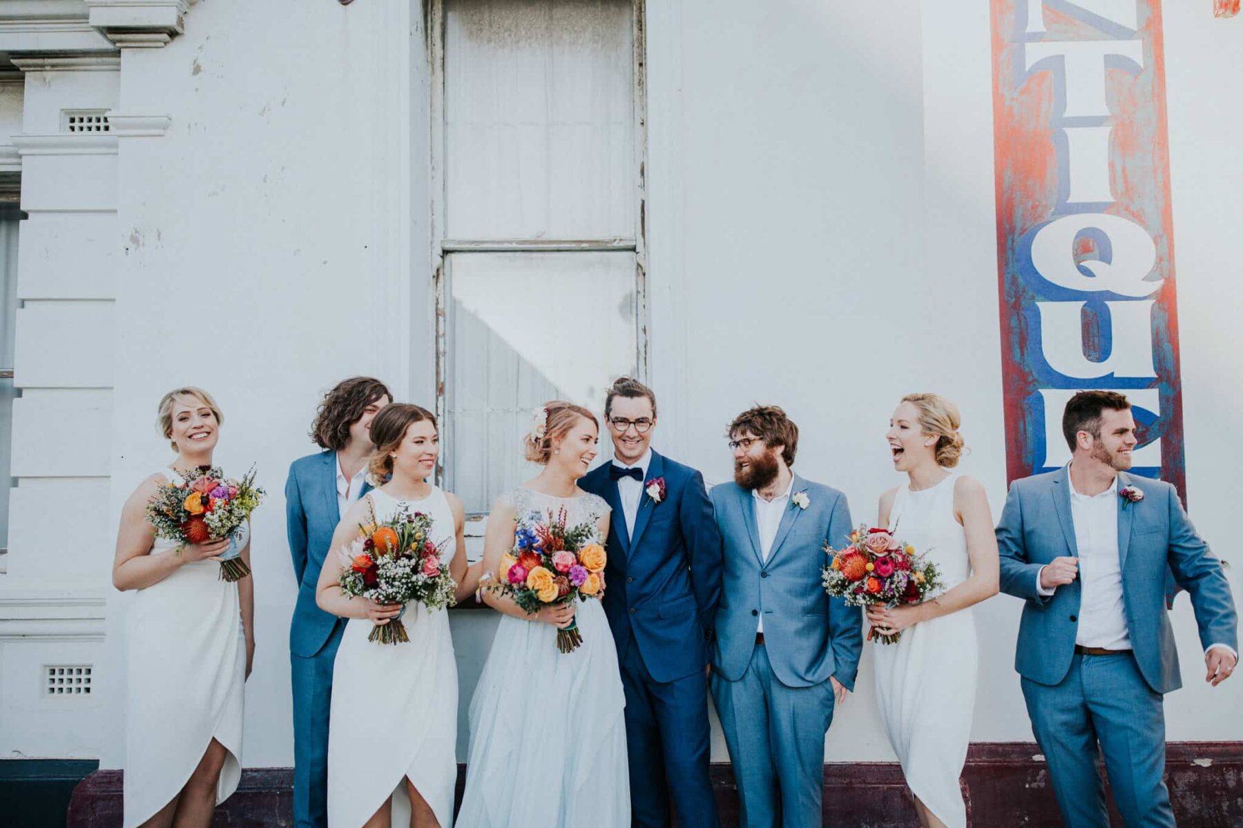 modern bridal party in white and blue