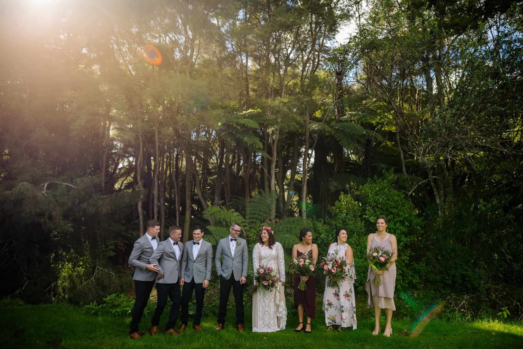 mismatched bridesmaid dresses in blush and burgundy tones