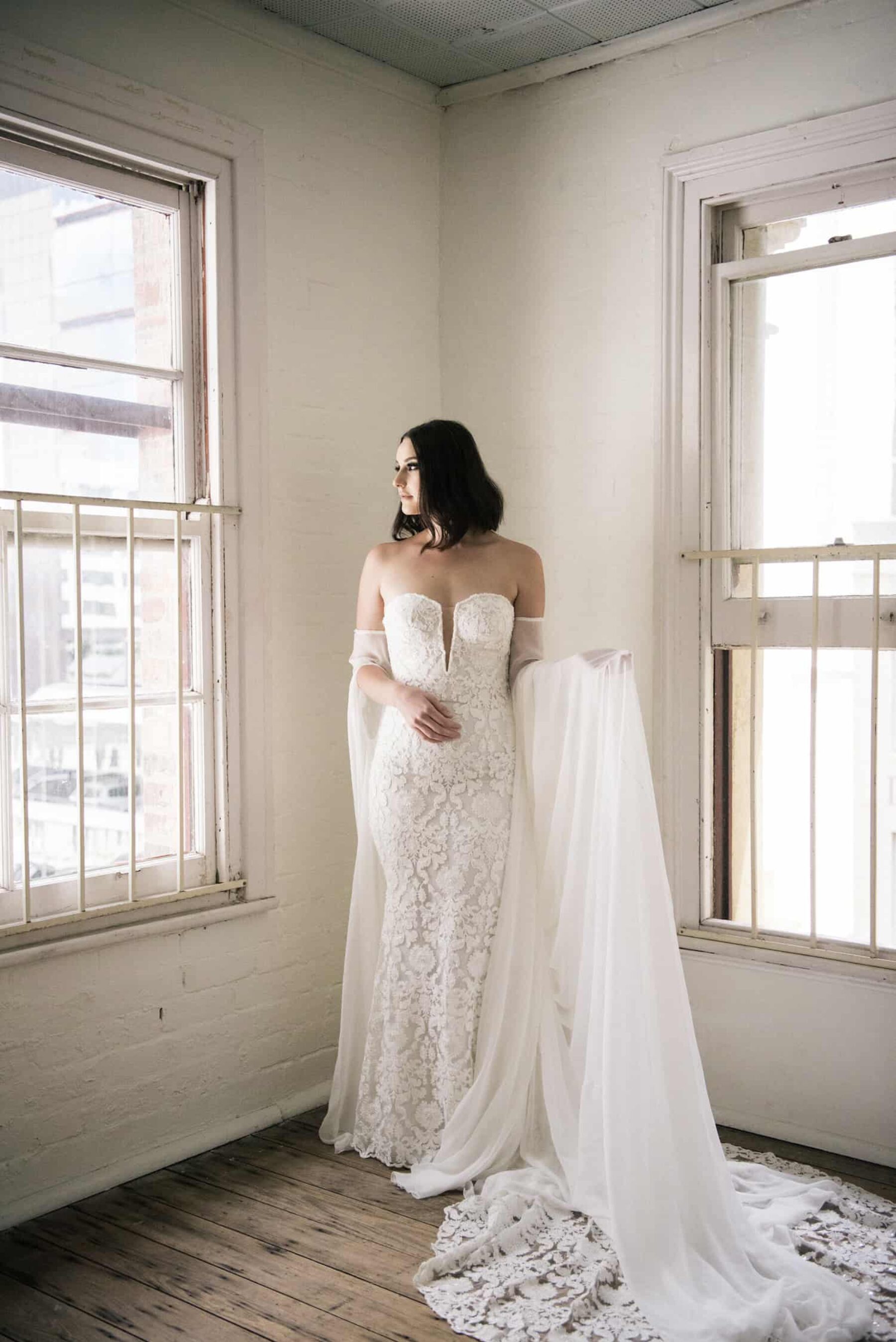 strapless wedding dress with sheer cape