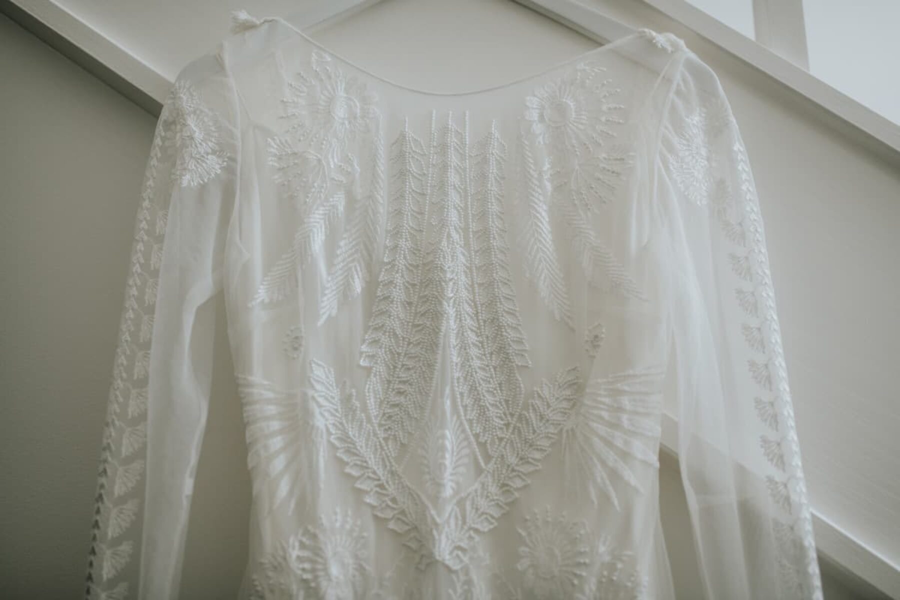 Long sleeve lace wedding dress by Rue de Seine