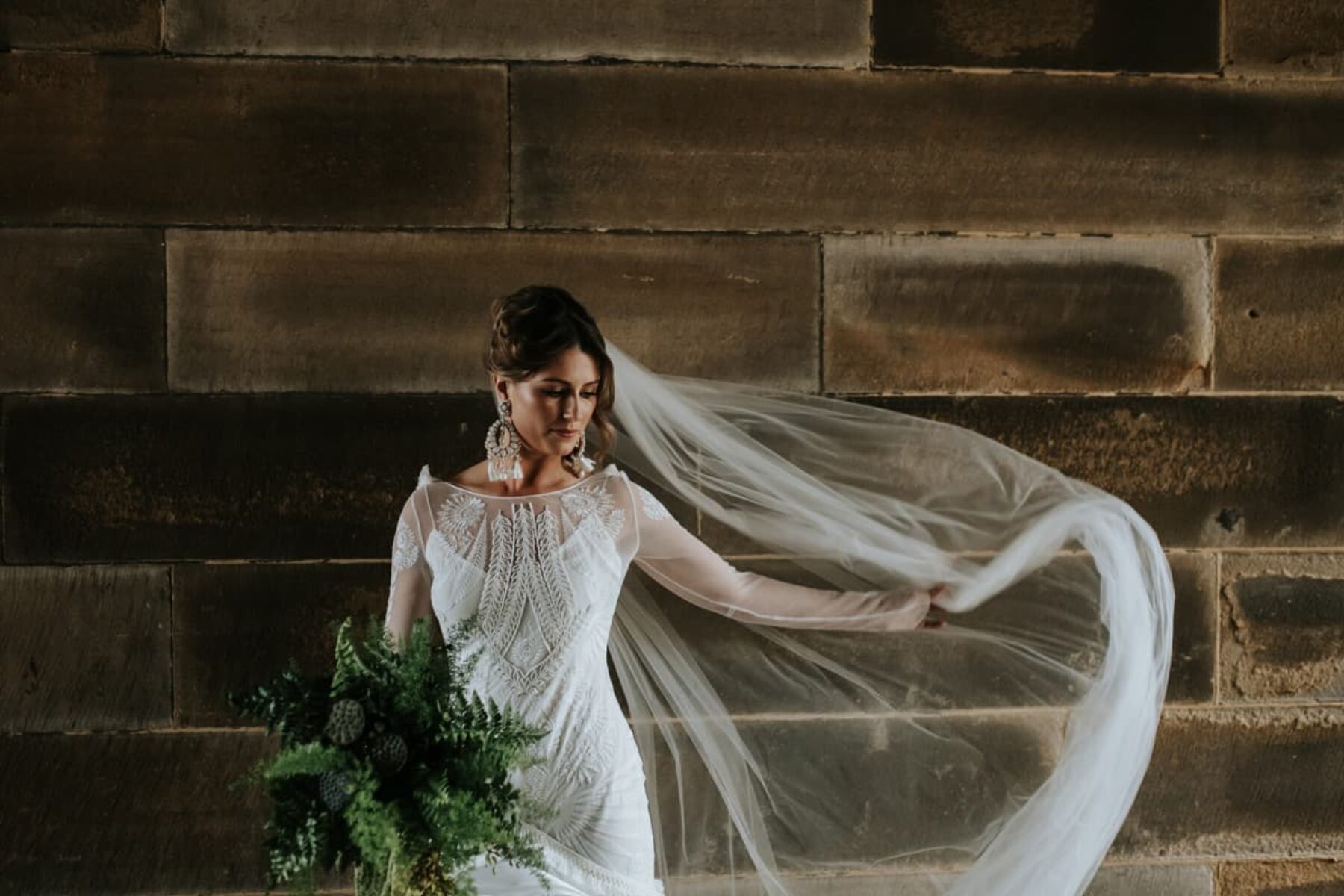 Long sleeve lace wedding dress by Rue de Seine