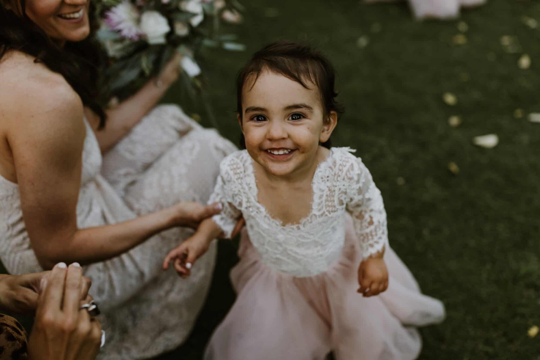 cutest flower girl in pink tulle and lace dress