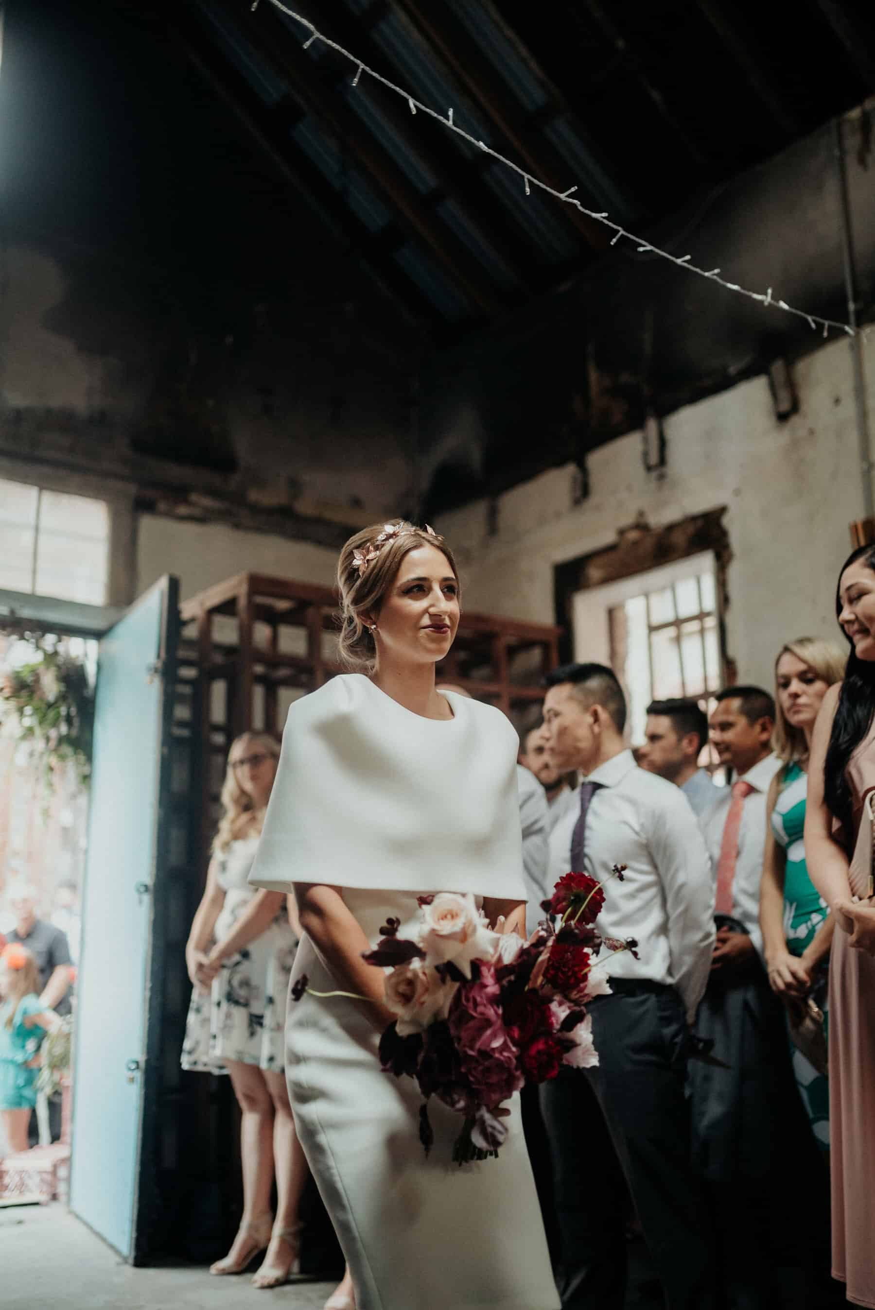 bridesmaid in modern white dress