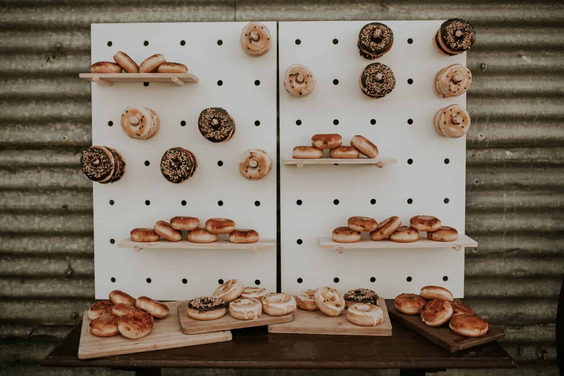 donut wall and dessert table