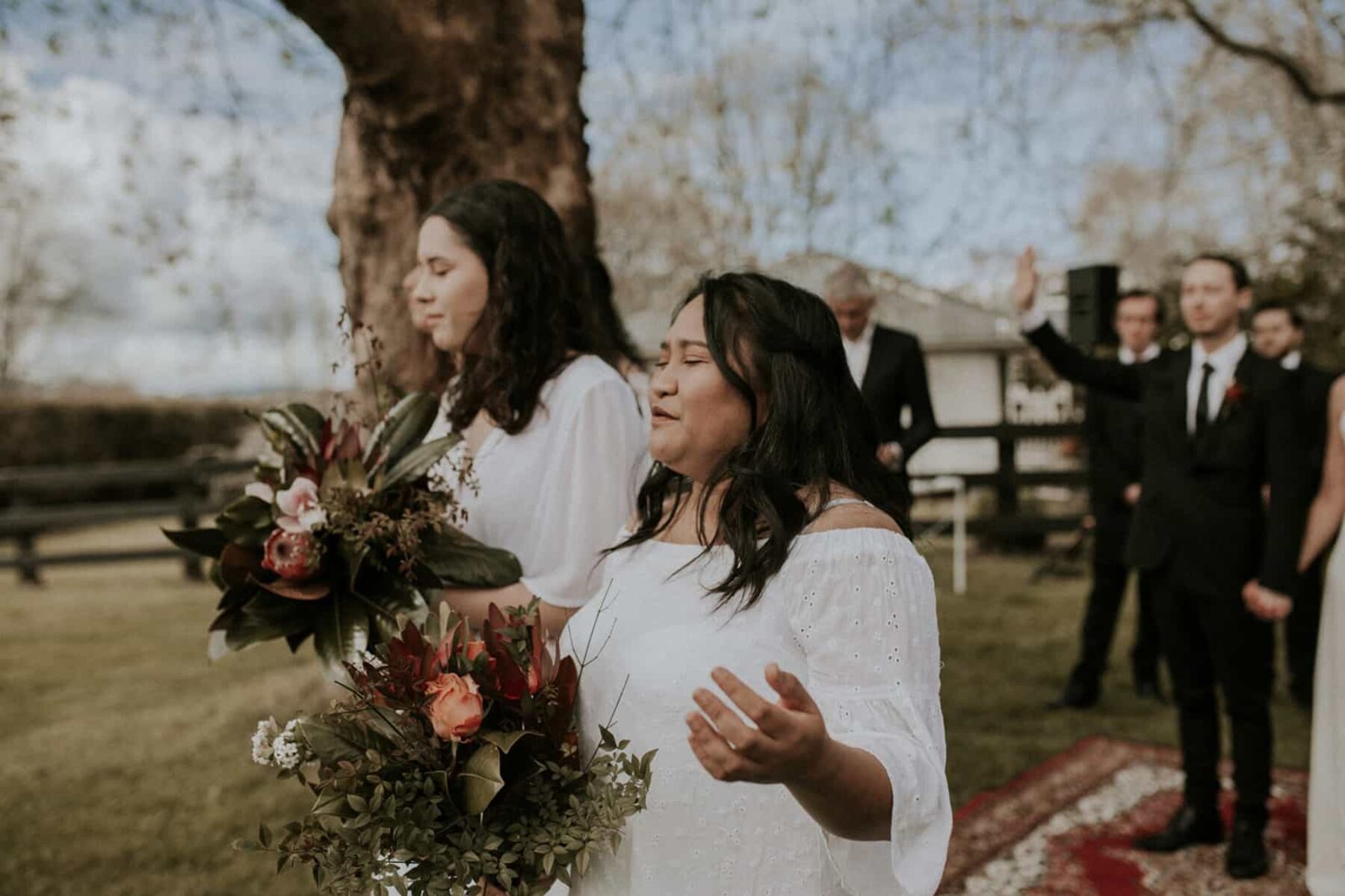 bridesmaids in mixed white dresses