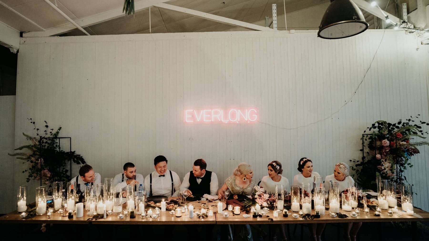 bridal table with 'Everlong' neon sign