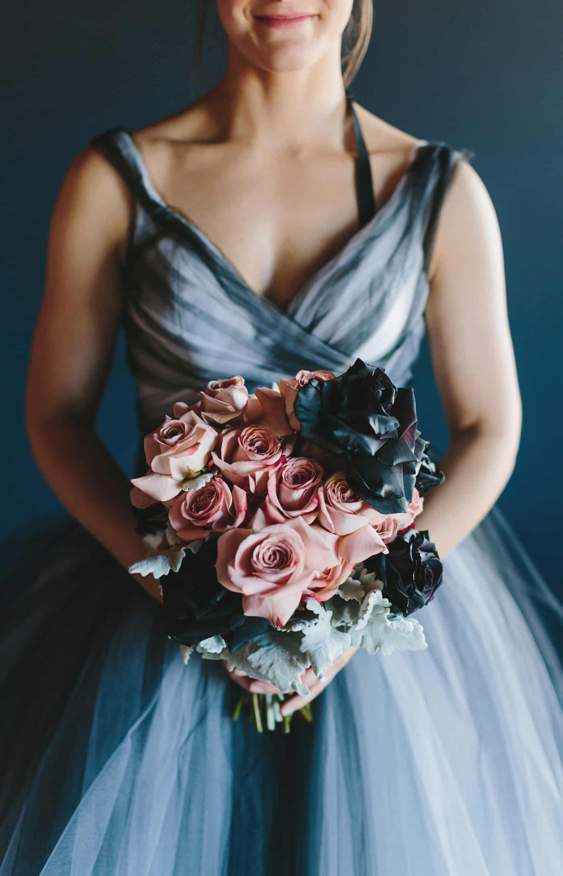 moody bridal bouquet with dusty pink black roses