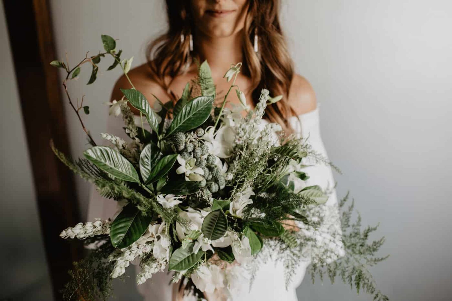 green and white bridal bouquet with silk ribbons