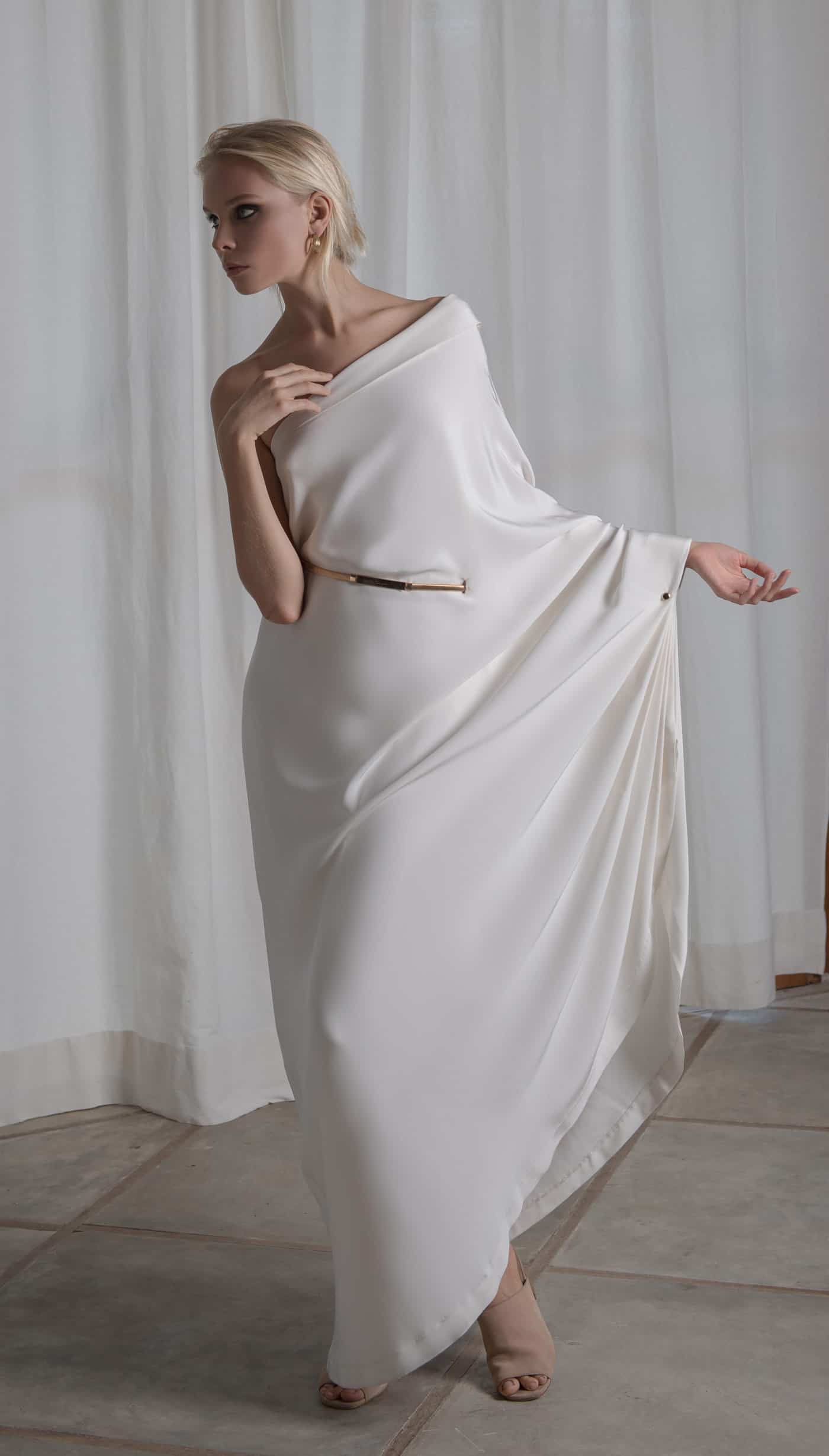 Grecian off-shoulder wedding dress by Lola Varma bridal