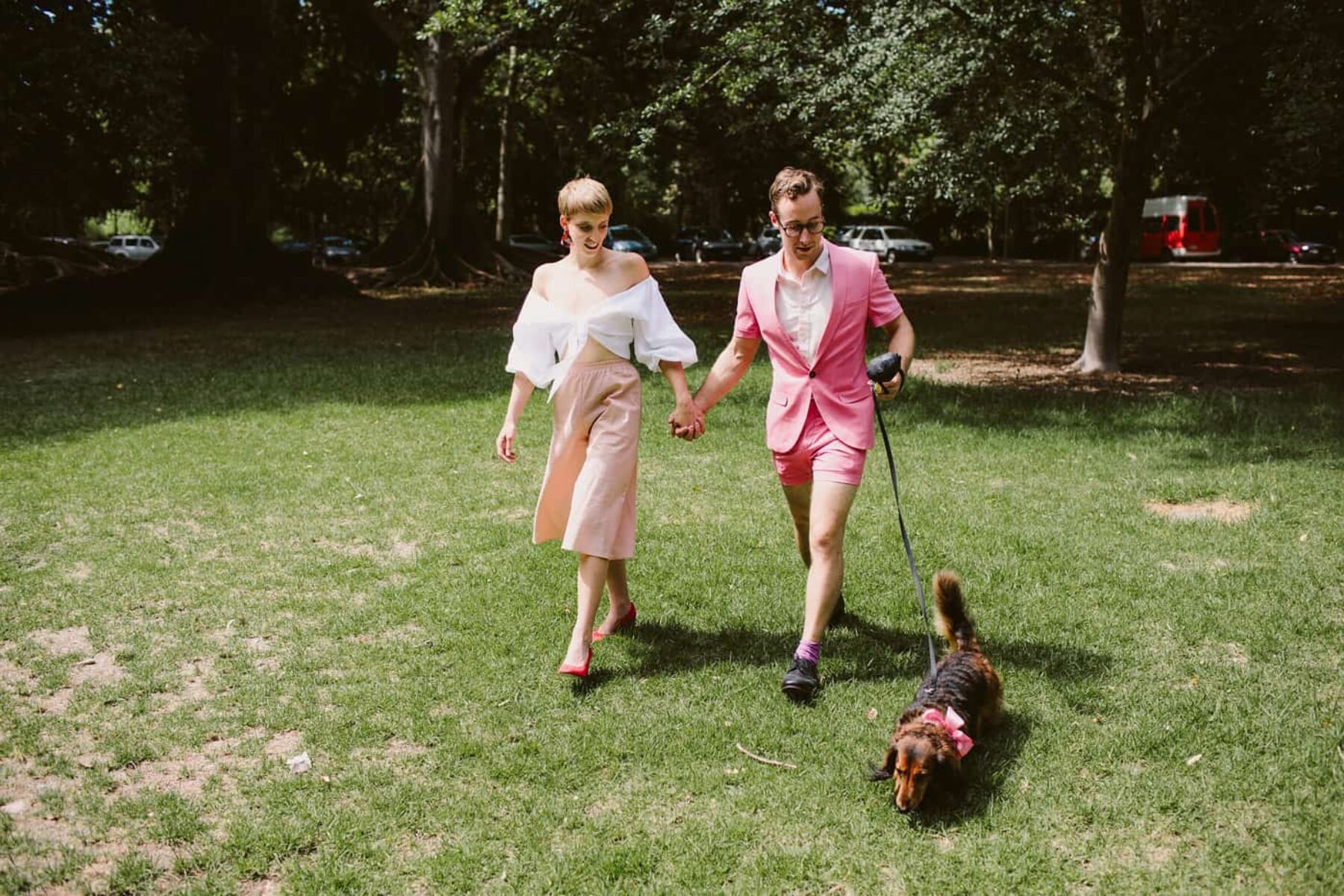 quirky bride and groom in pink