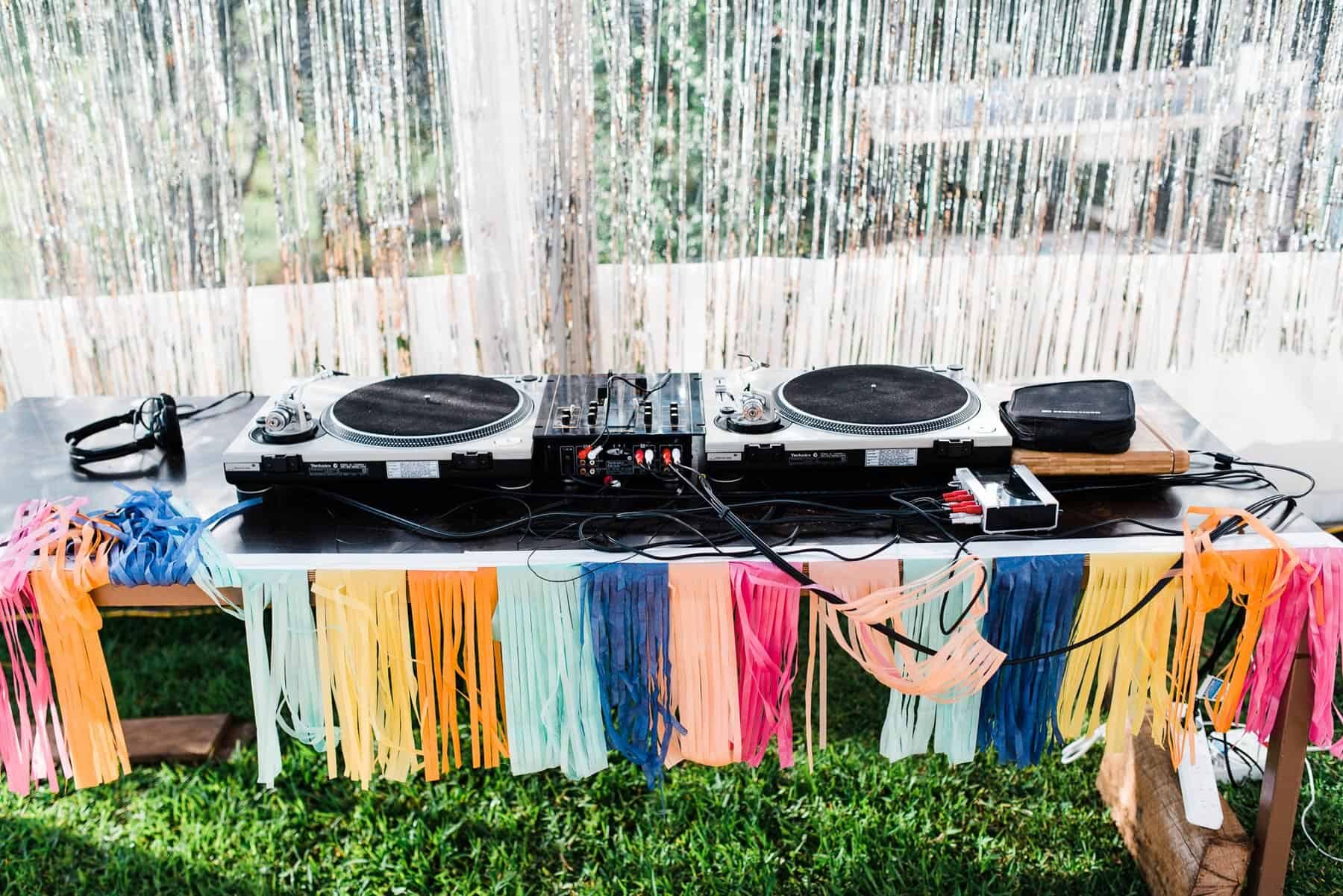 DJ decks with colourful fringe tassels