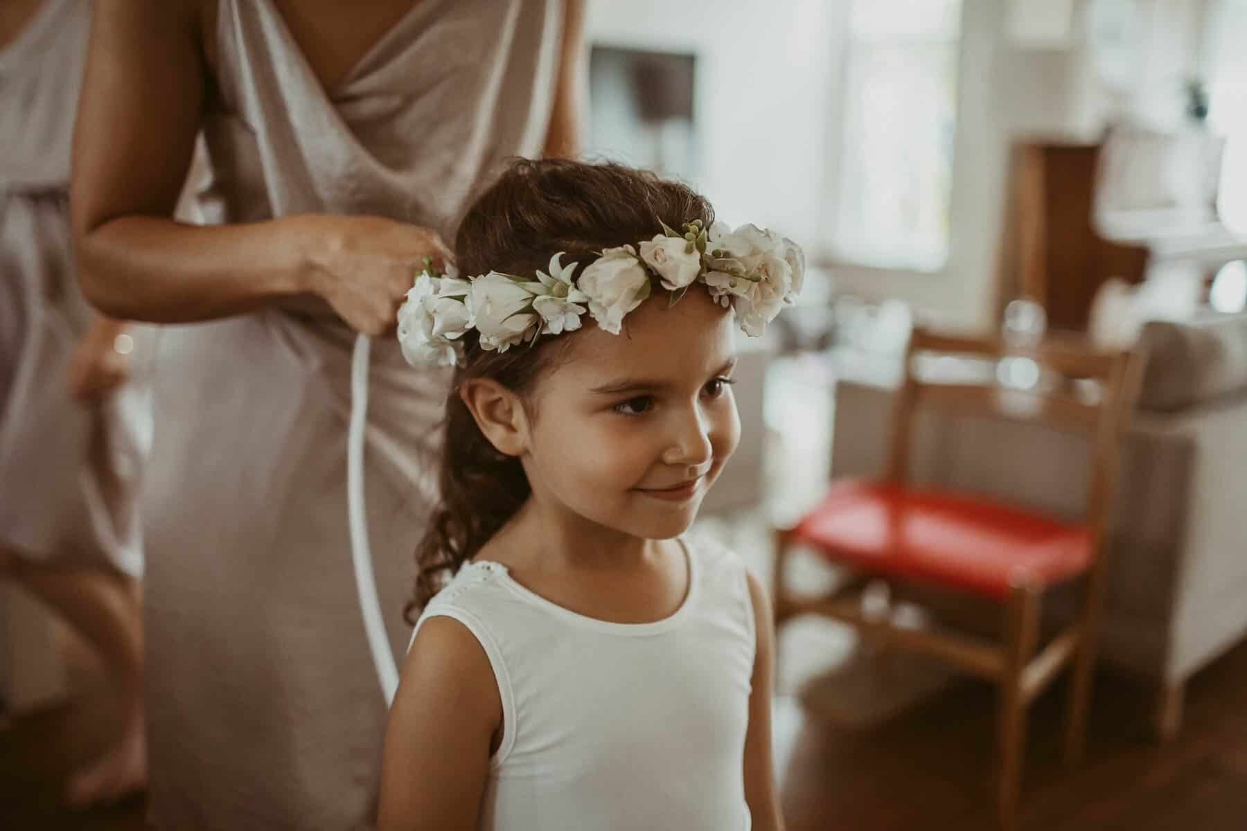 flower girl with white flower crown