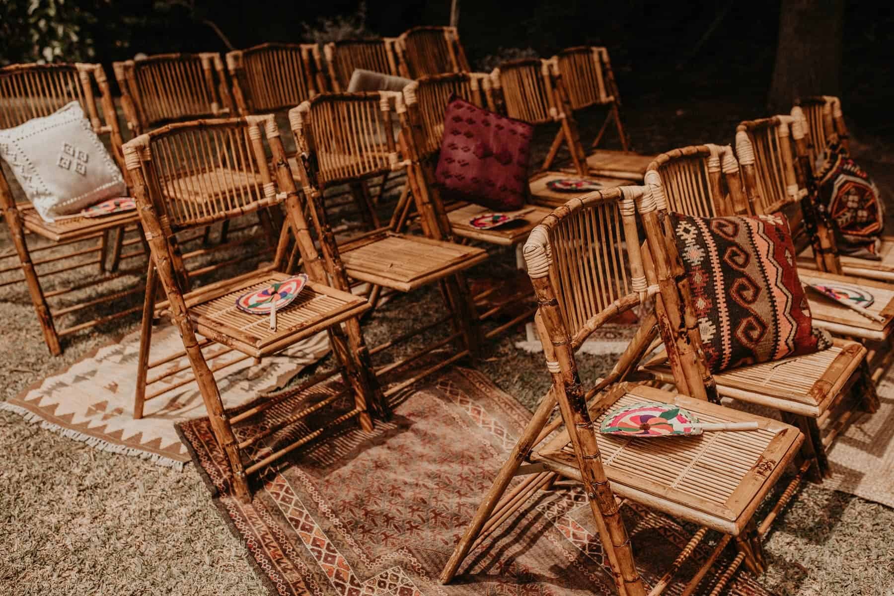 rustic bamboo chairs for a boho wedding ceremony