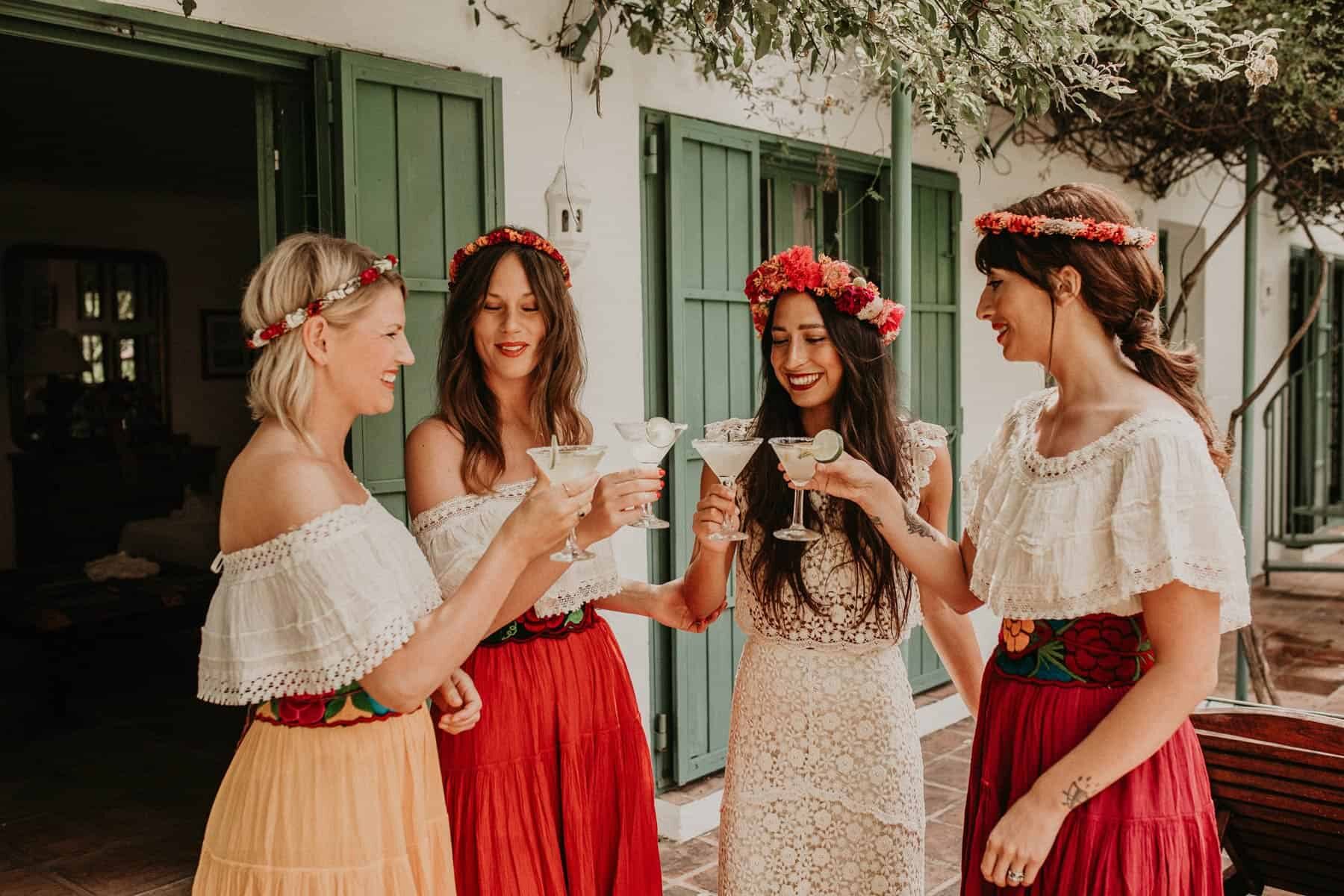 boho bride and mismatched bridesmaids with flower crowns