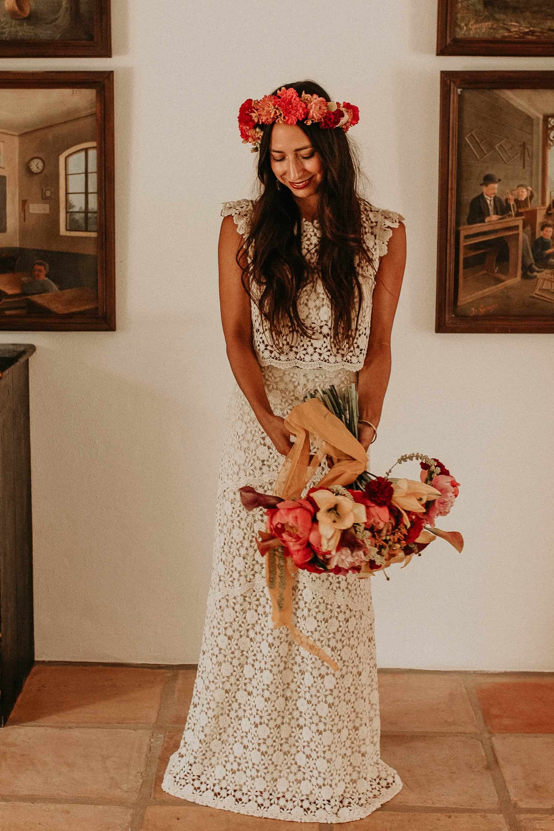 boho bride in two piece crochet wedding dress and Frida Kahlo flower crown