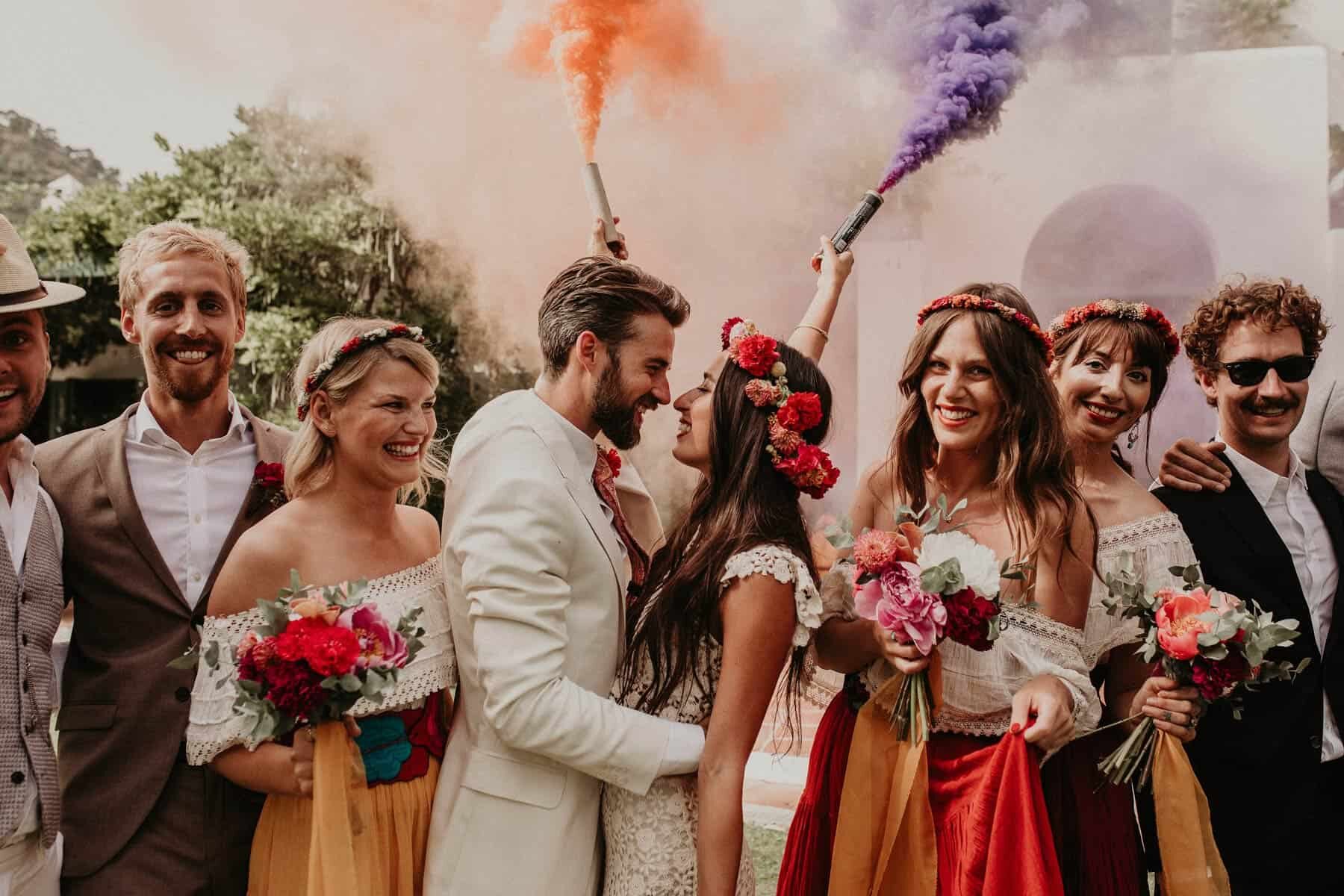 vibrant boho Mexican wedding with colour smoke bombs