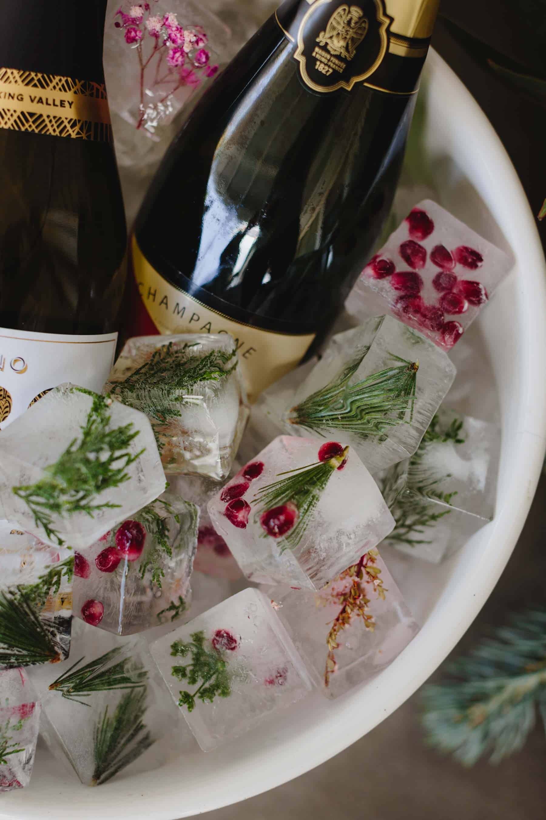 Christmas ice blocks with pine, berries and edible flowers