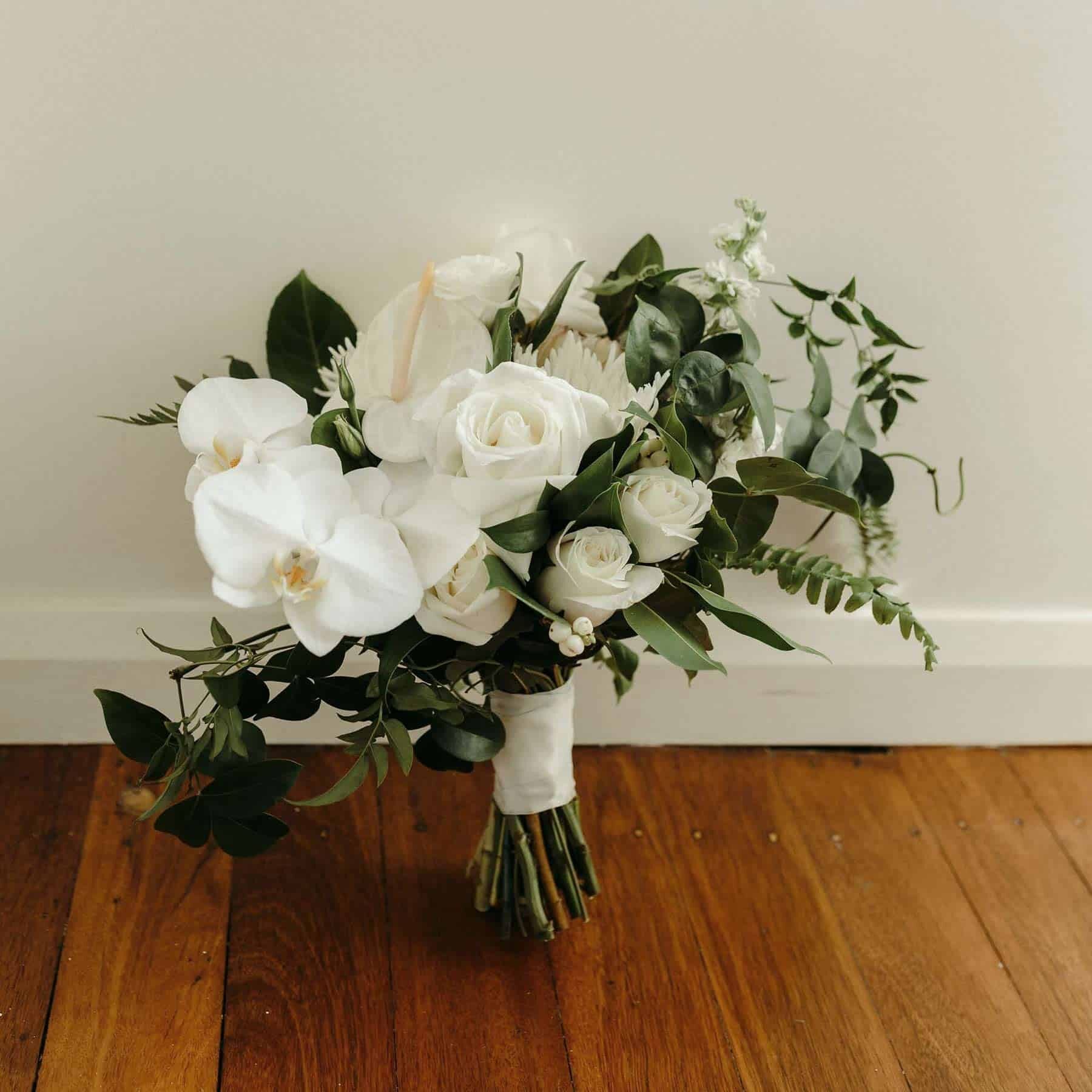 White roses and greenery bridal bouquet