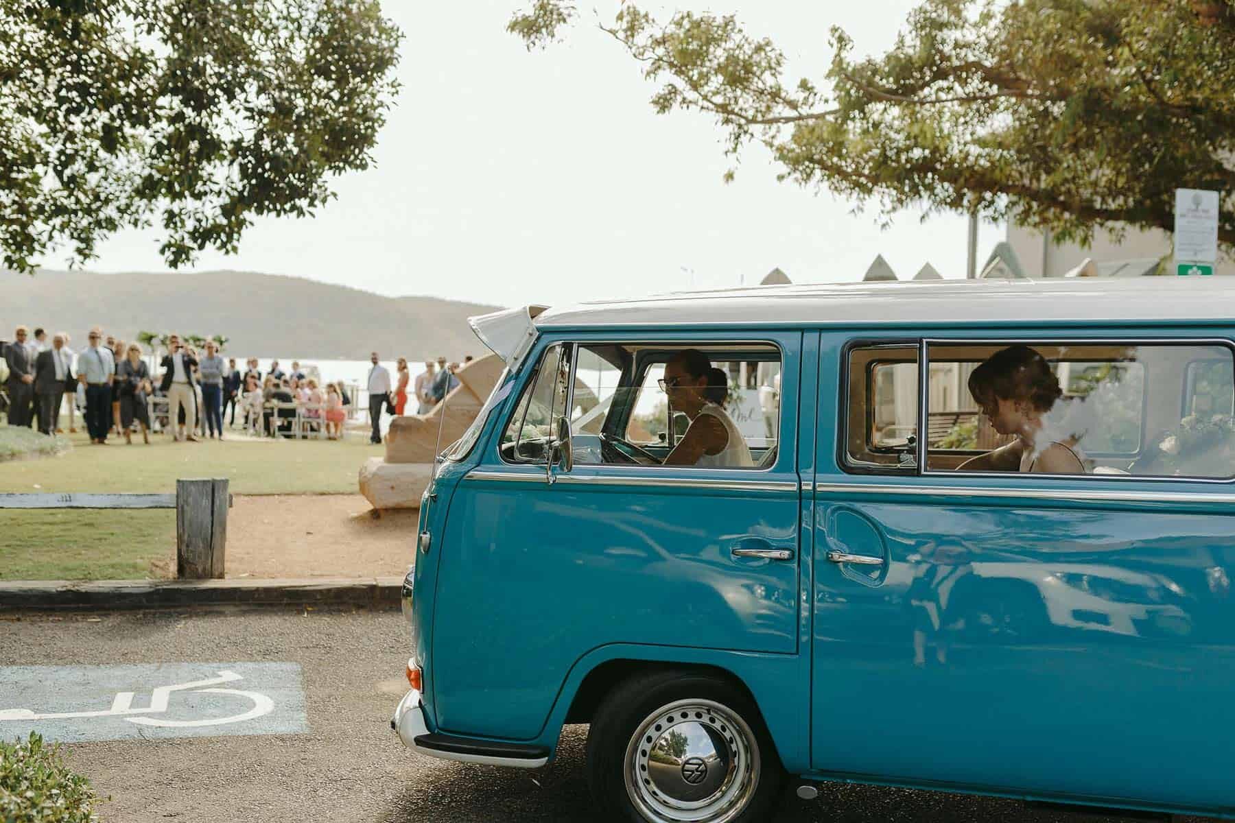 Rustic Kombi Van at beach wedding