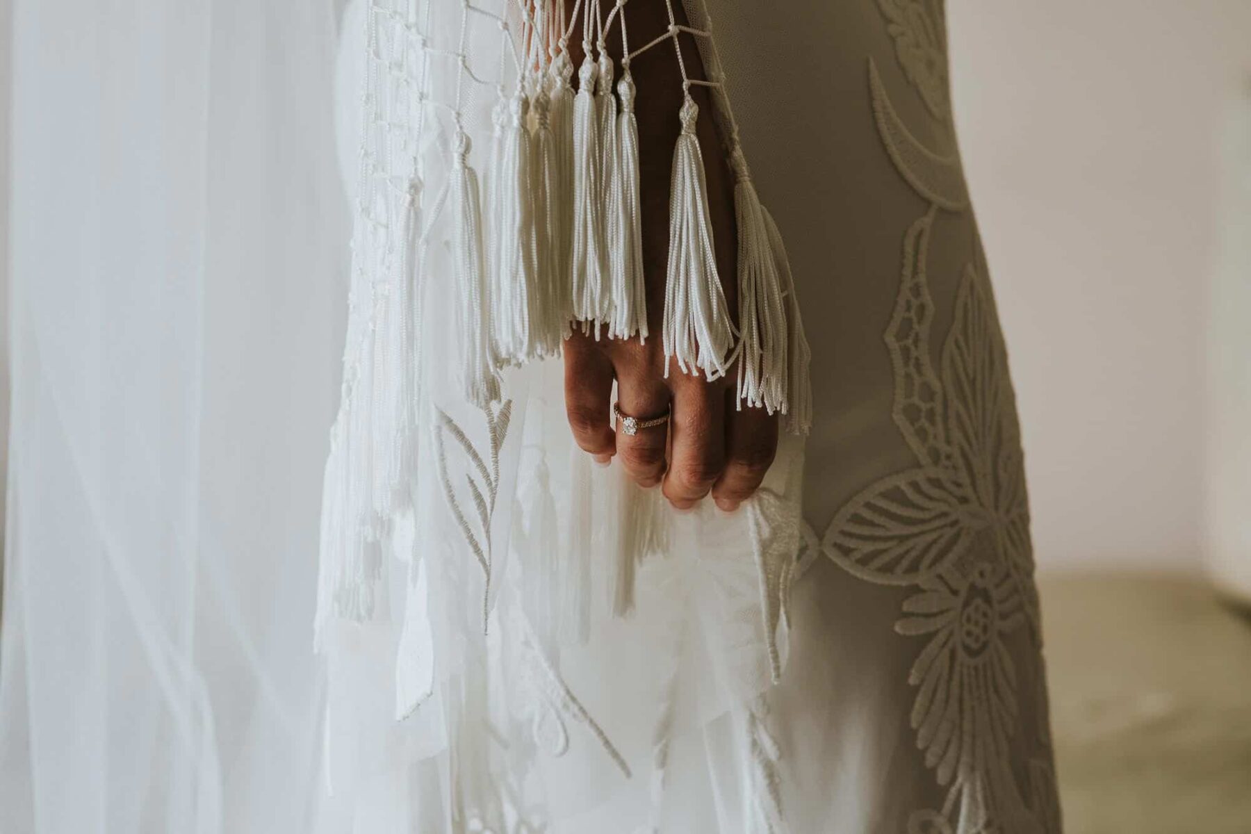 boho bride in long sleeve lace wedding dress by Rue de Seine