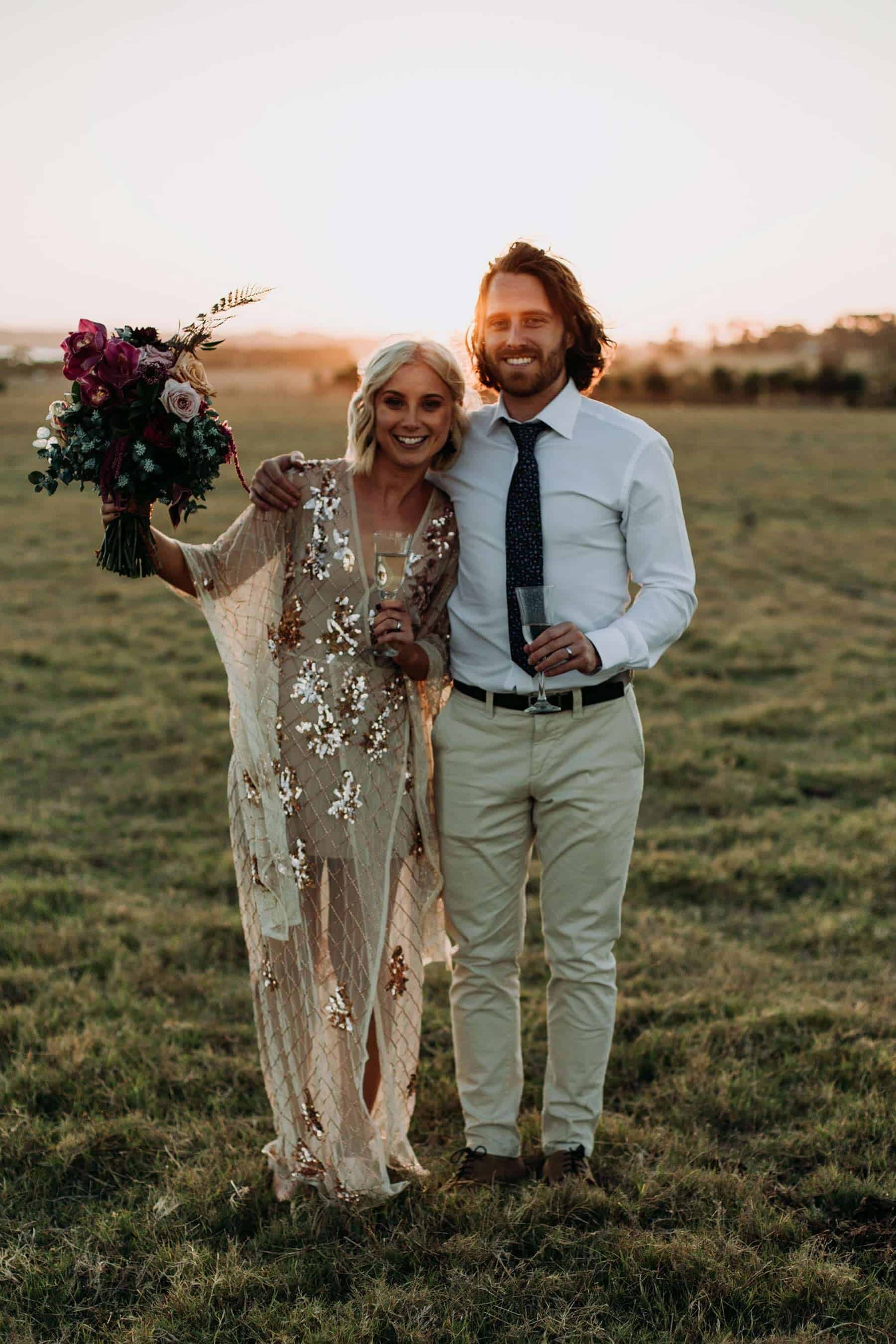 boho rose gold wedding dress with flared long sleeves