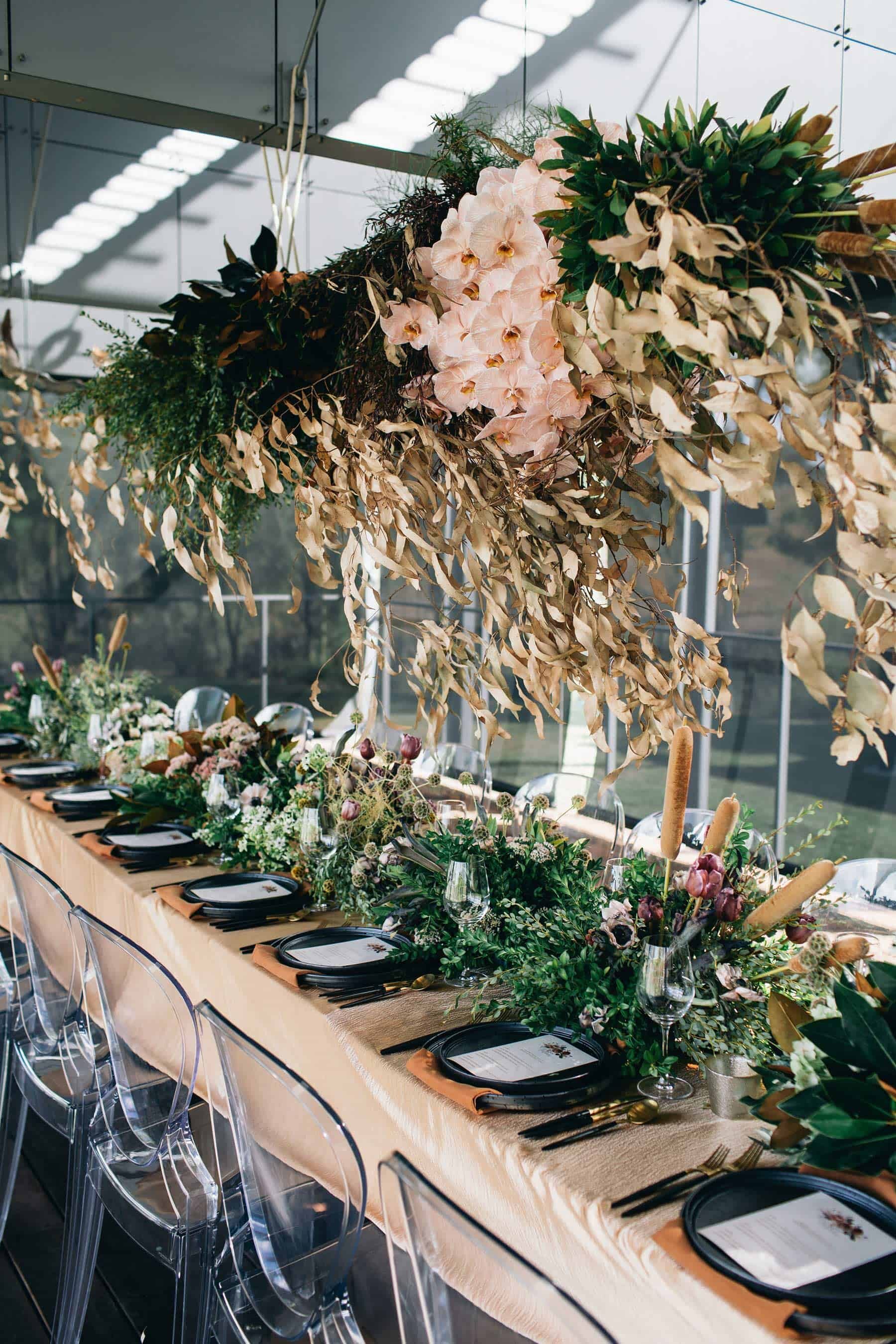 hanging floral installation with dried leaves