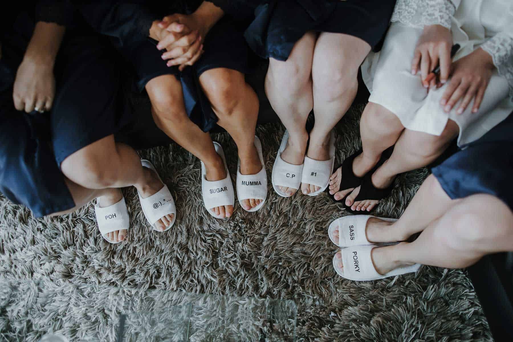bridesmaids getting ready with personalised slippers