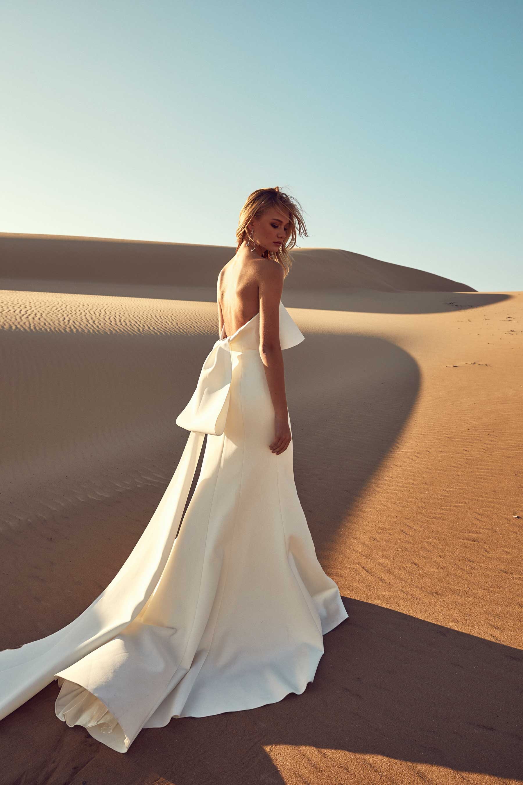 modern wedding dress with statement bow