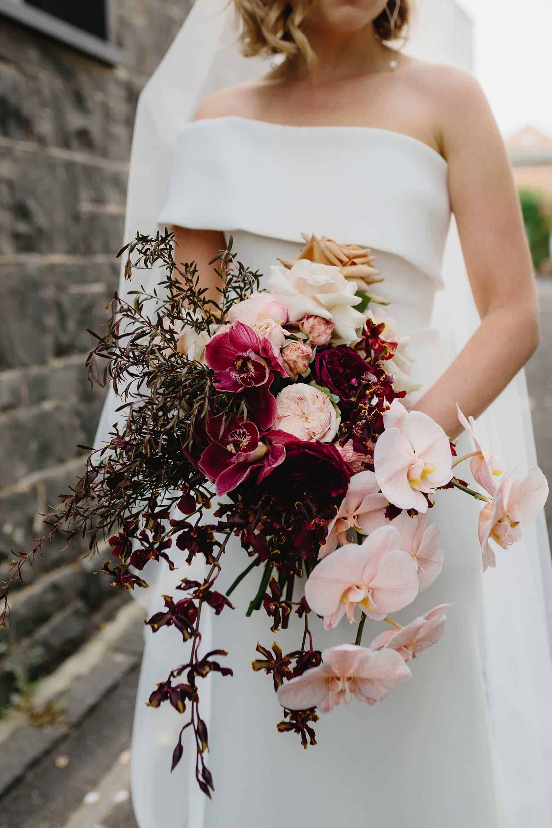 unstructured bridal bouquet with blush orchids