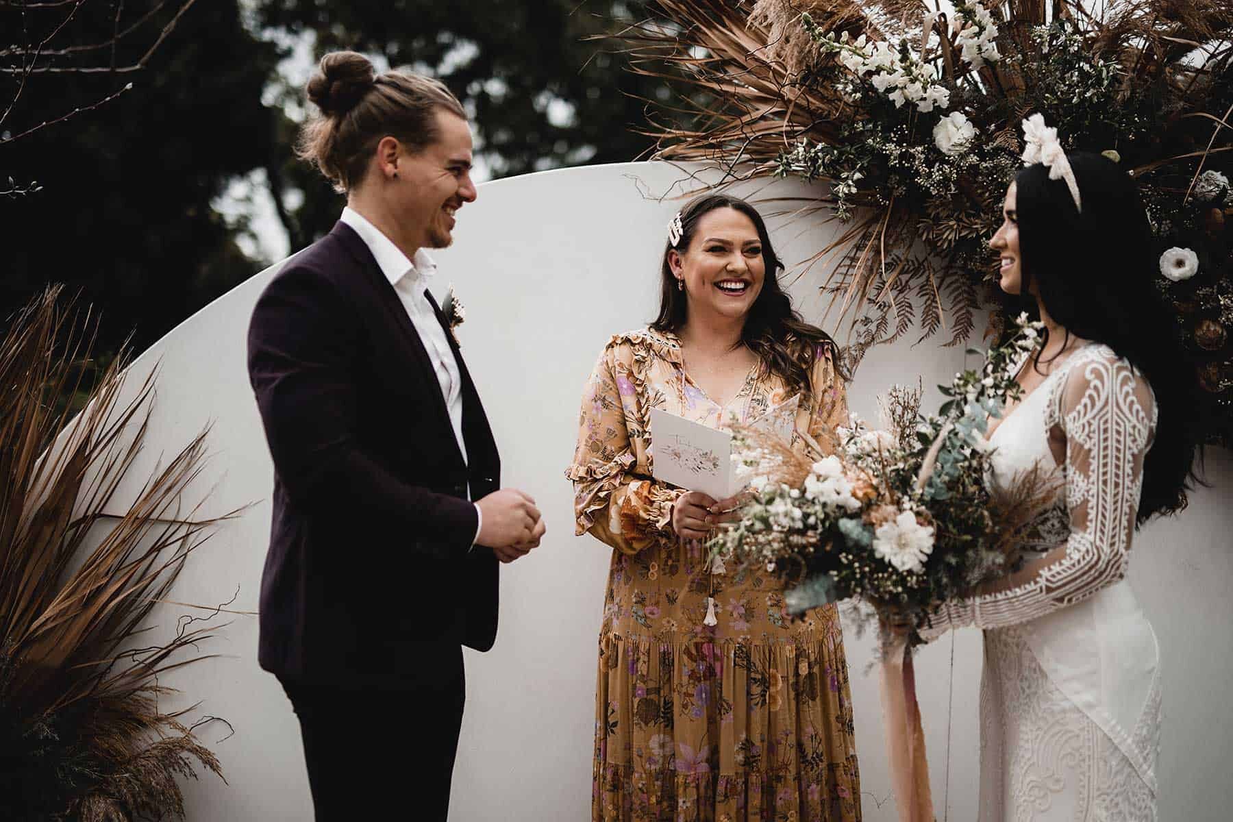 semicircle wedding arbour with dried flowers