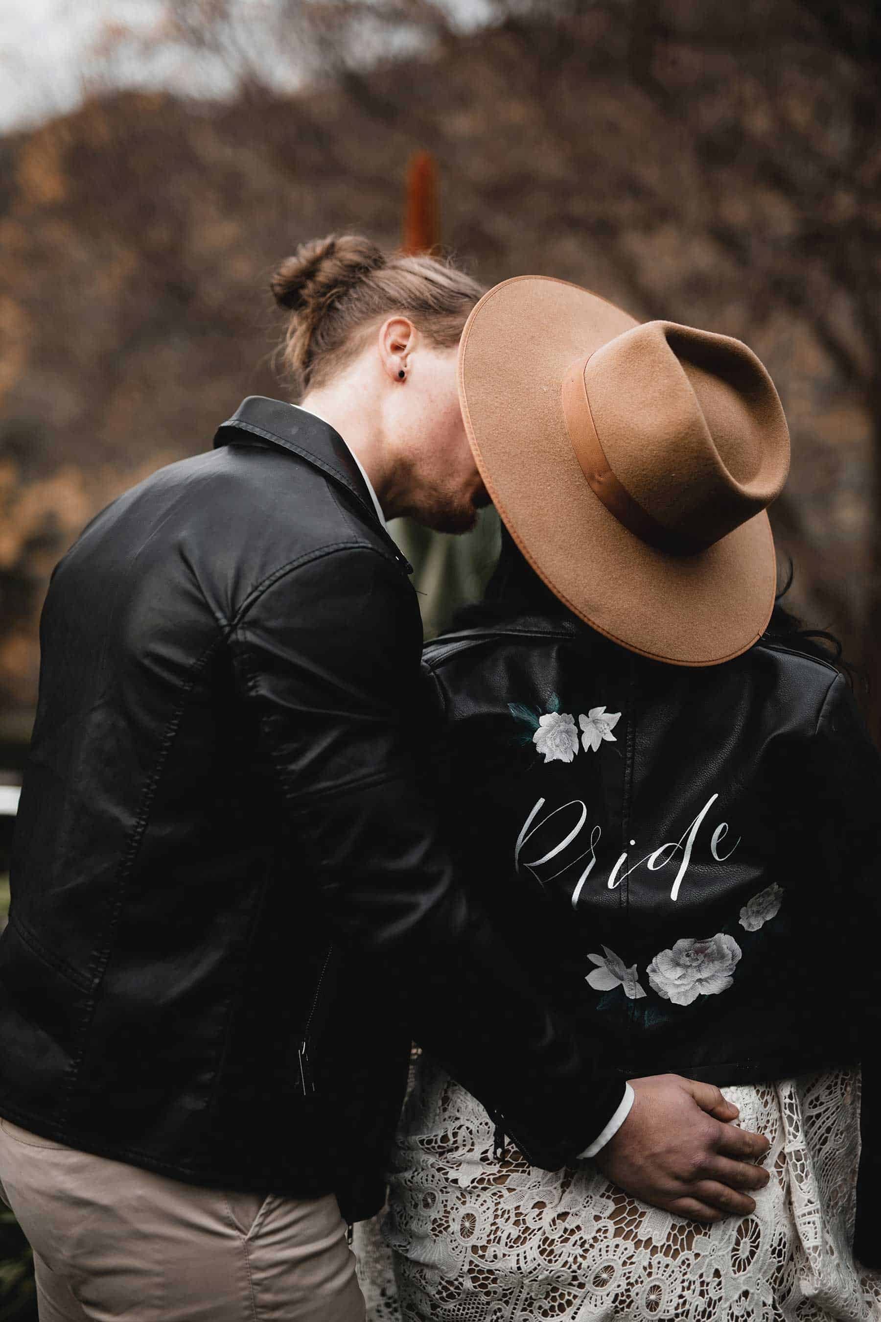 boho bride with hat and leather jacket