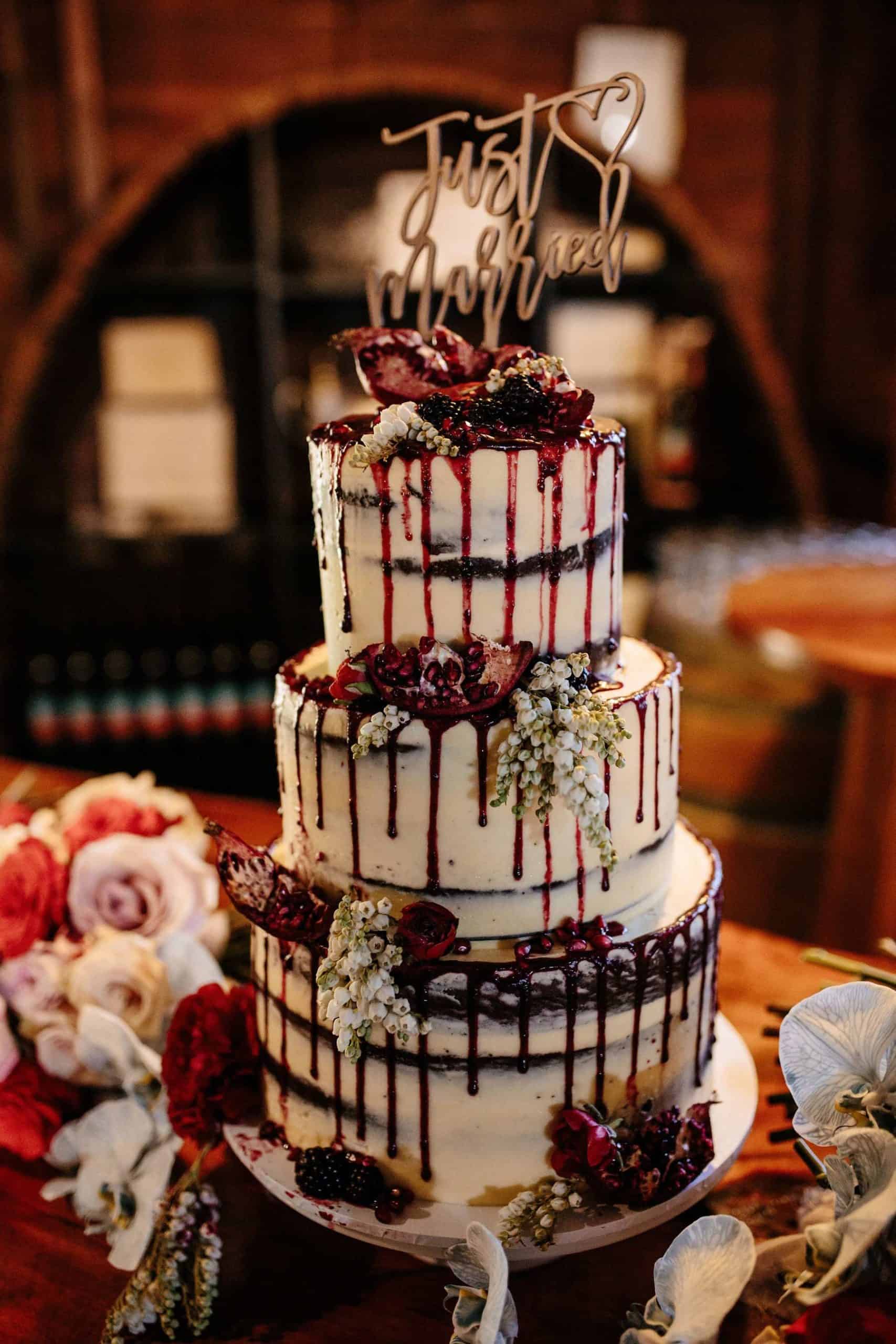 best wedding cakes of 2019 - 3 tier chocolate cake with berry drizzle