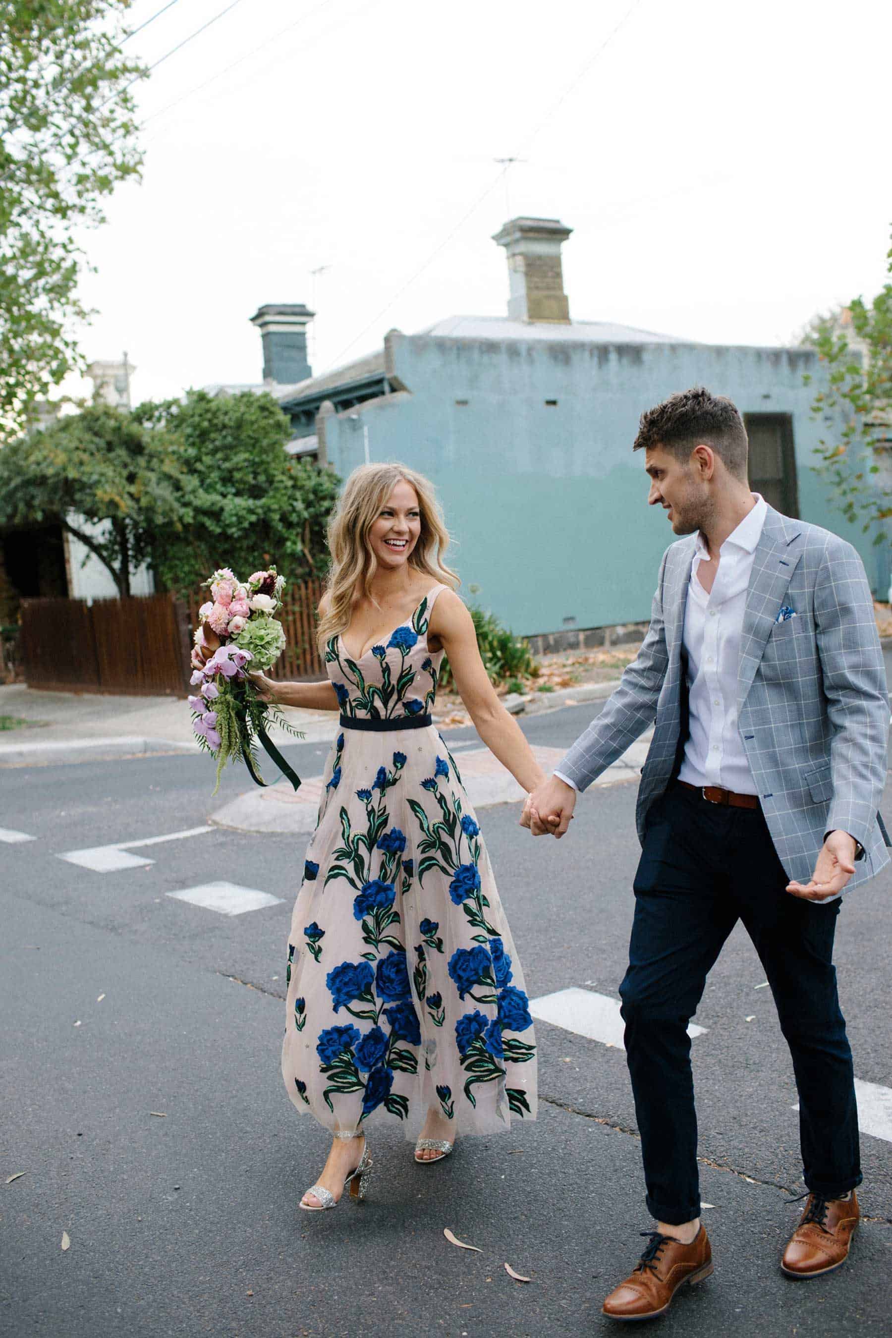 Best wedding dresses of 2019 - blush dress with blue floral applique
