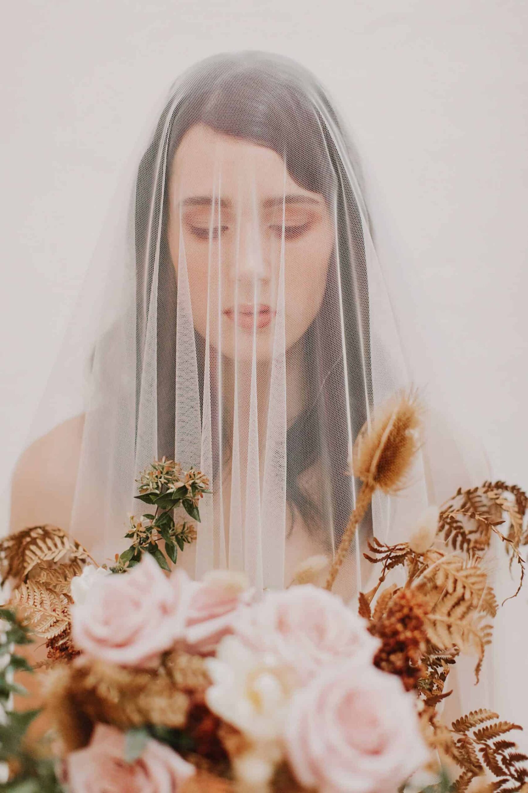 ethereal bride with blush bouquet