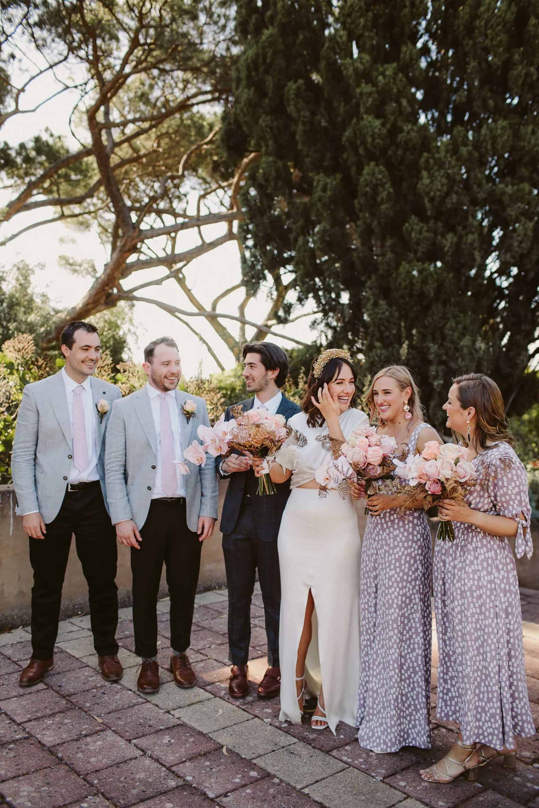 modern bridal party in pastel blue and lilac