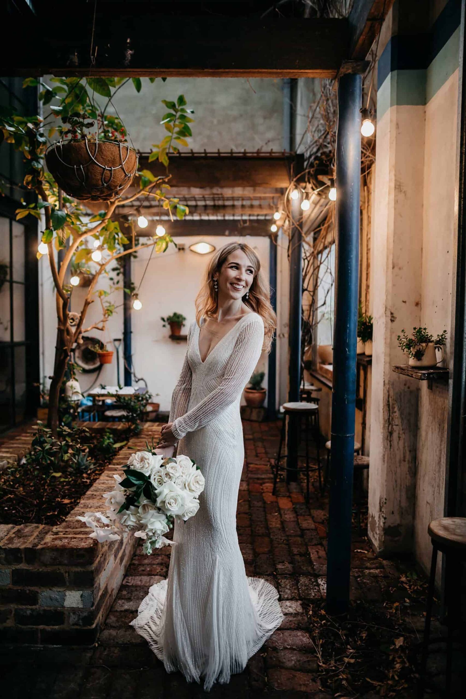 long sleeve beaded wedding dress by Rachel Gilbert