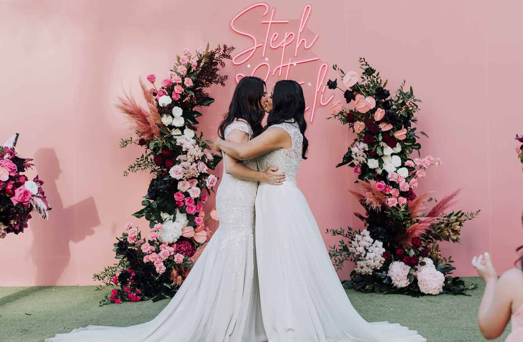 two brides pink wedding with amazing flowers