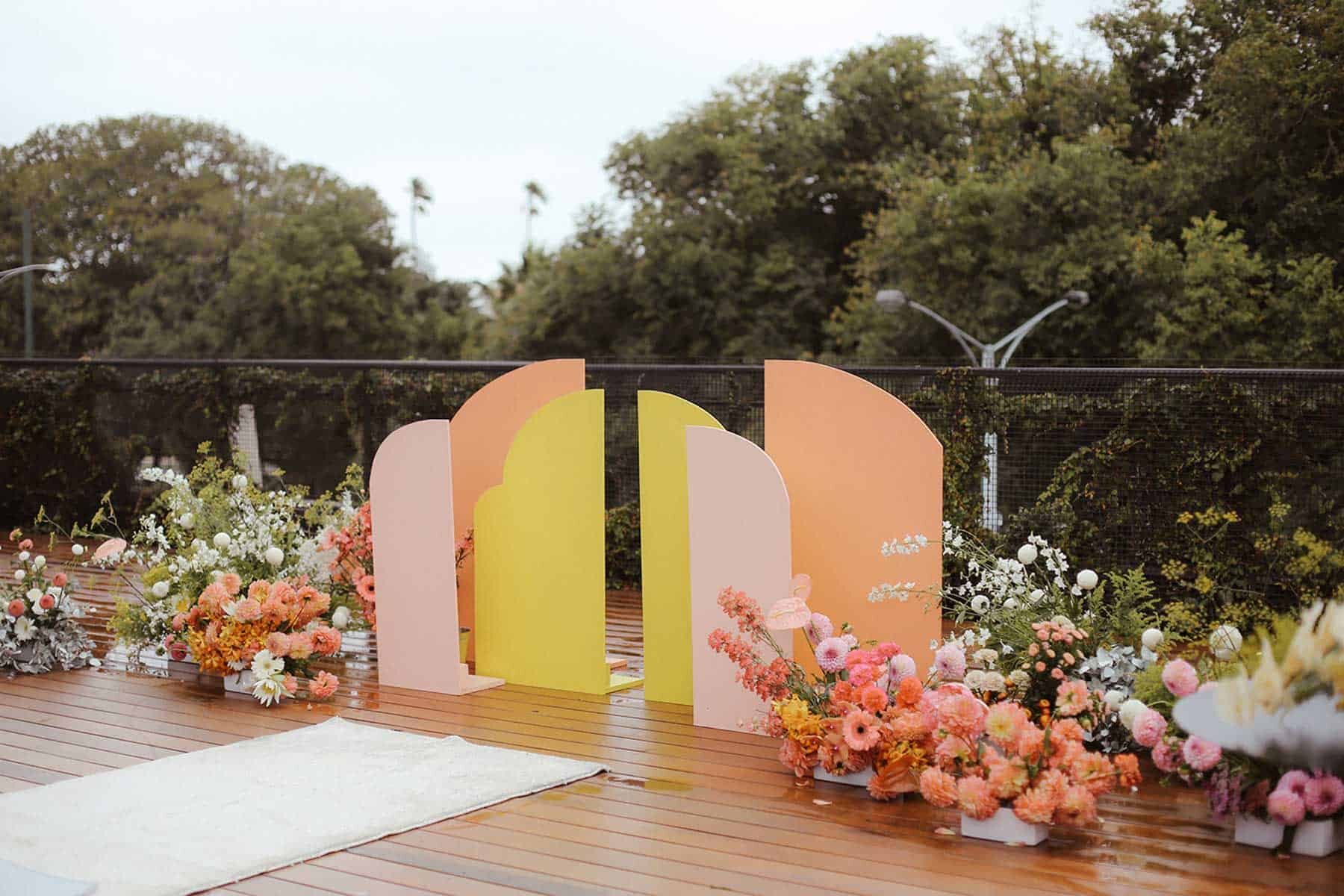 rooftop wedding with geometric arbour