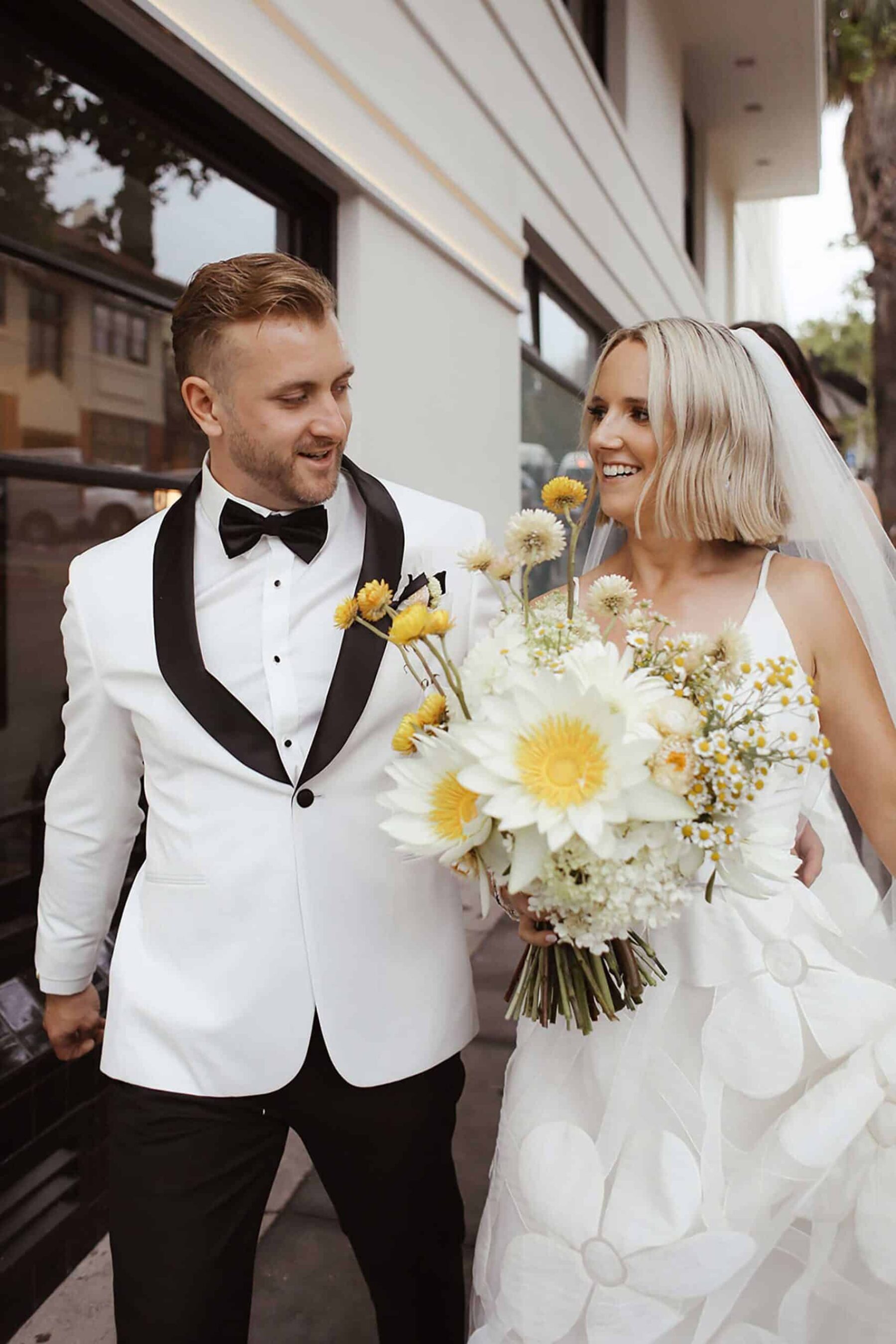 all-white bridal bouquet with lilies