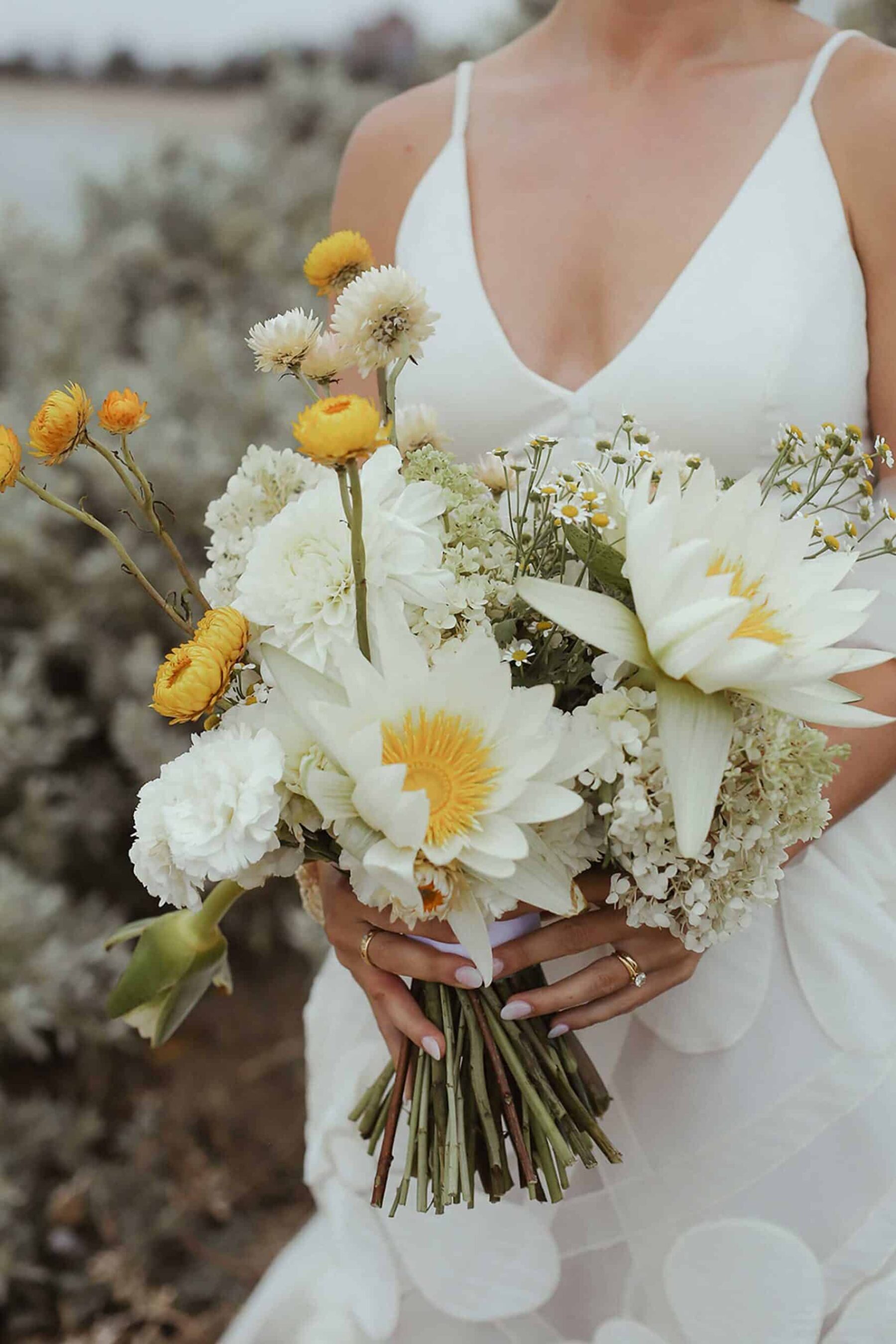 all-white bridal bouquet with lilies