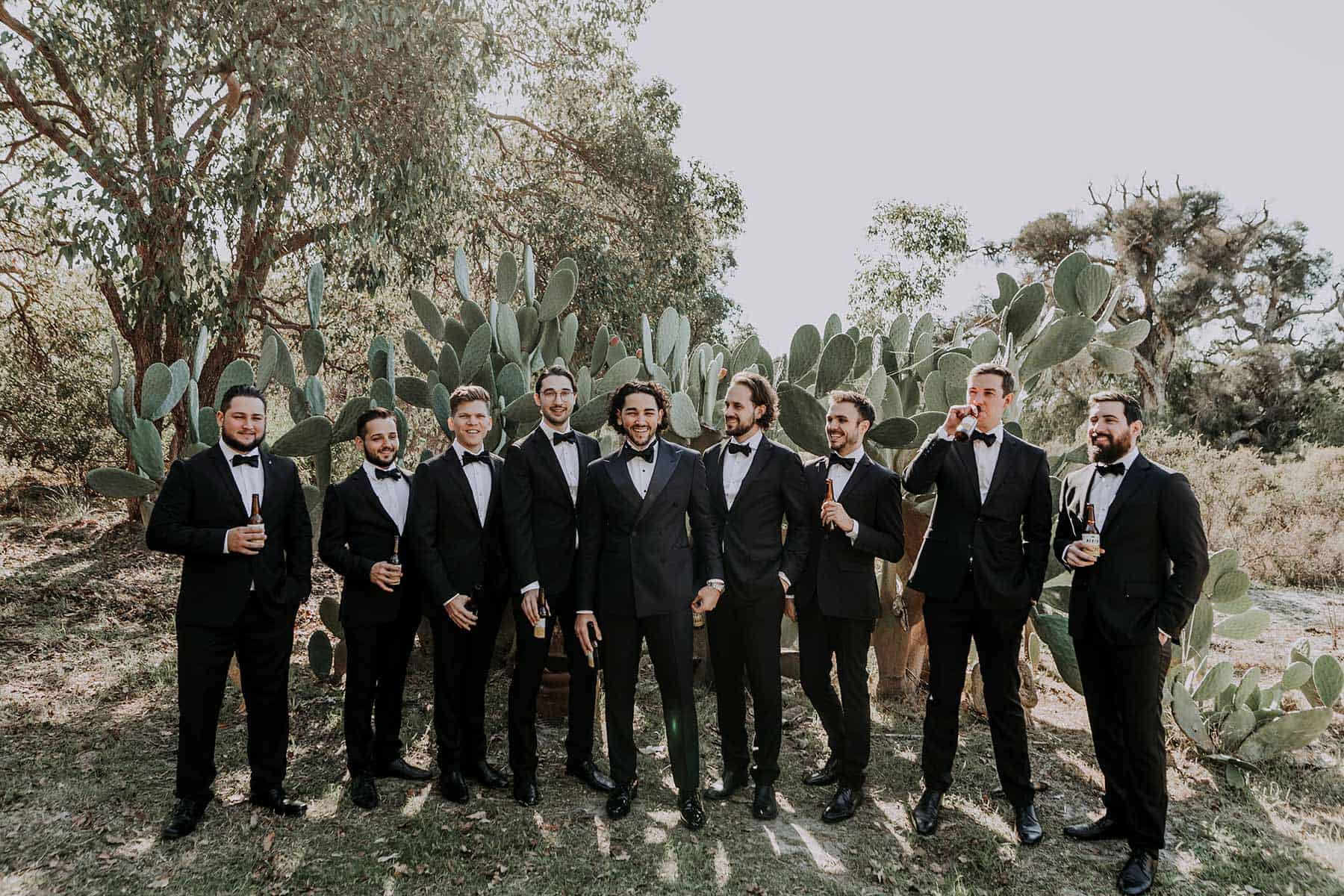 modern all-in-black groomsmen