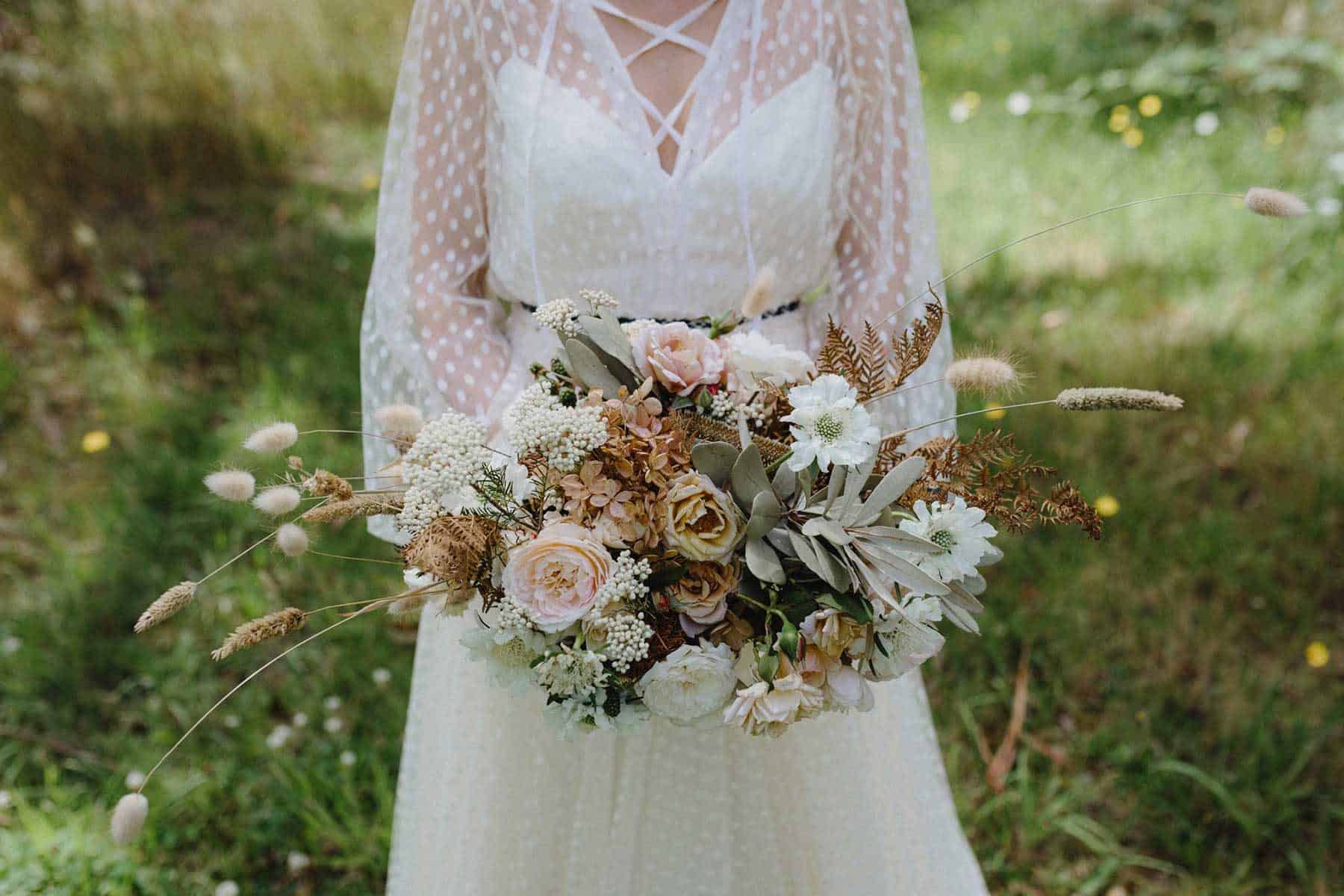 unstructured bridal bouquet with foraged grasses