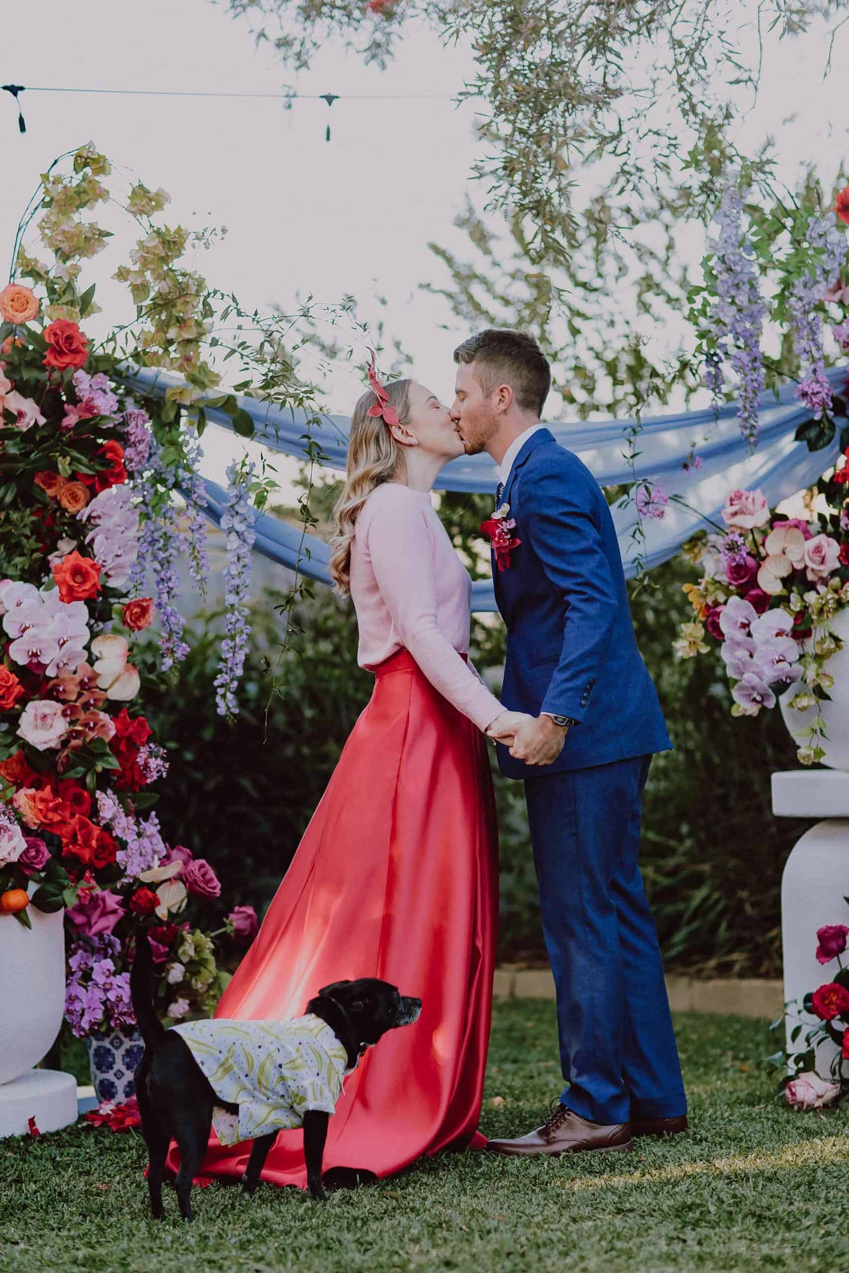 bride in red skirt and pink top