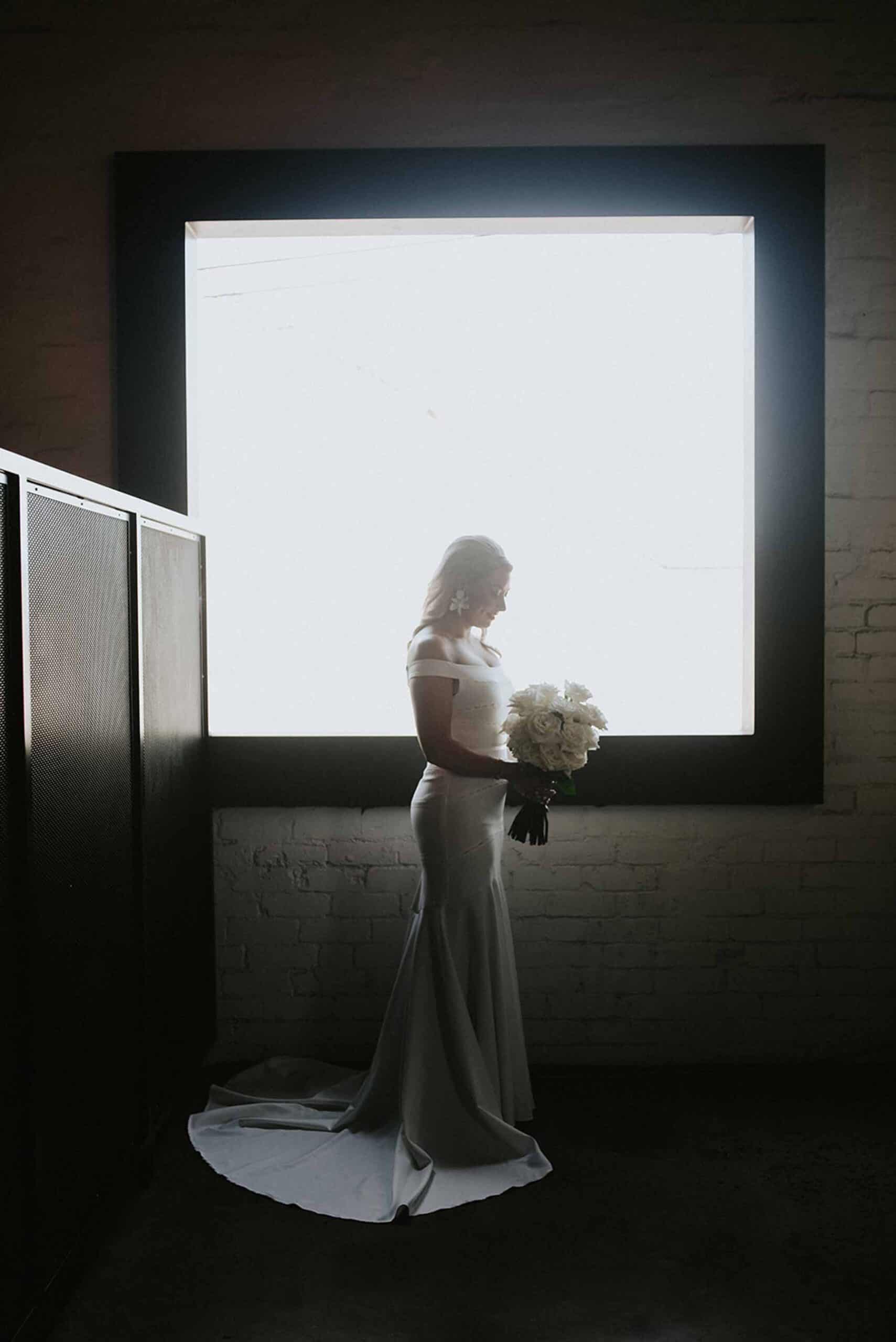 modern minimal off-shoulder wedding dress