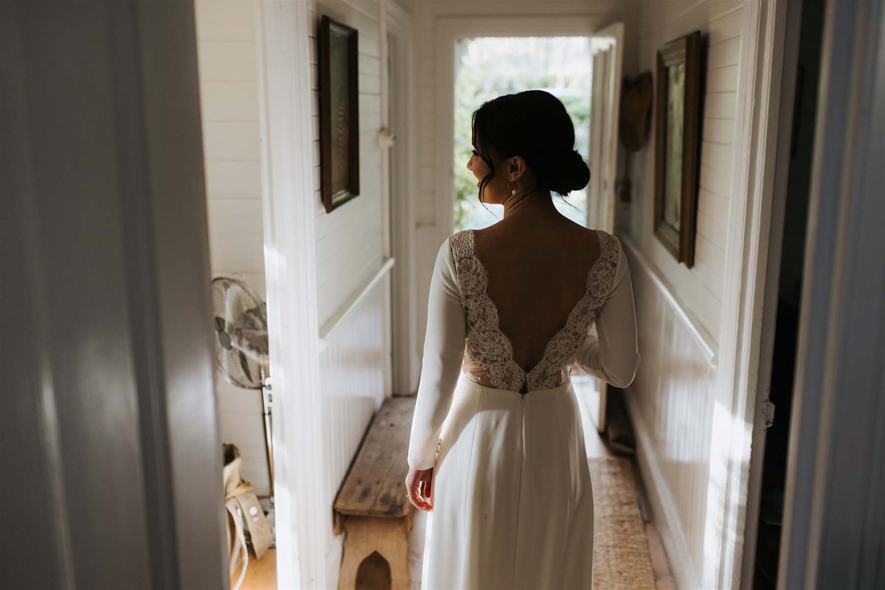 Bride's low back Amy Kuschel Wedding Dress
